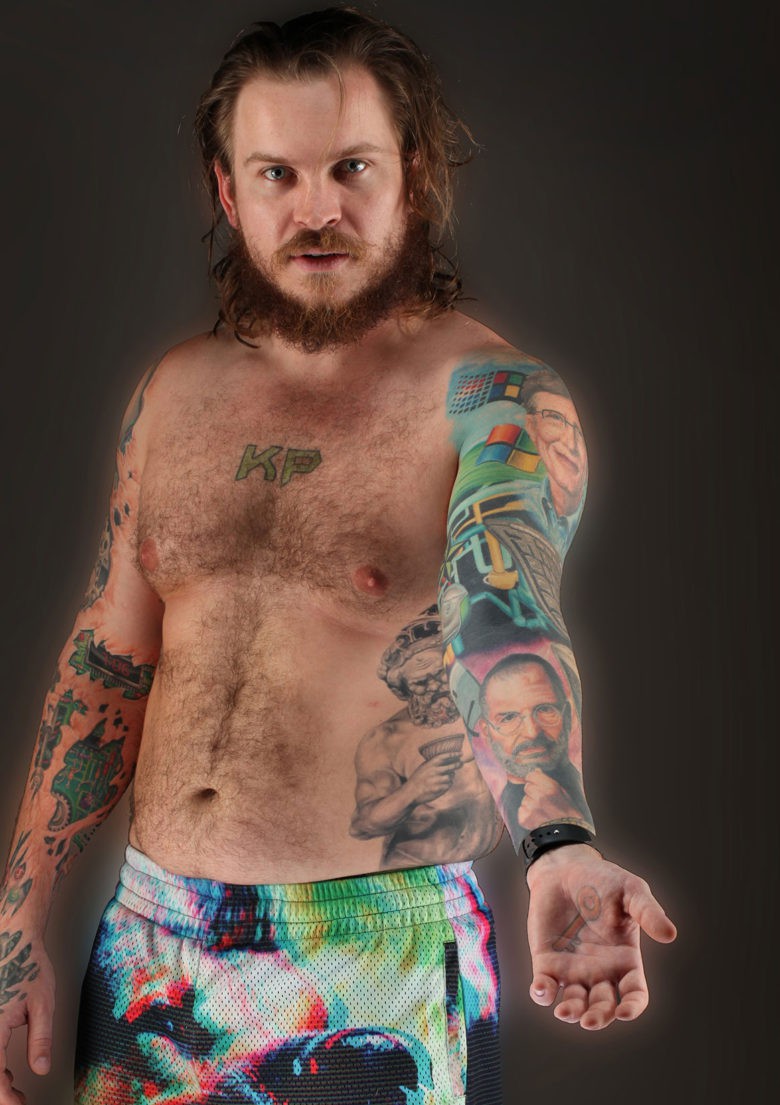 The story of technology is being painted on the body of Kenny Pollock.