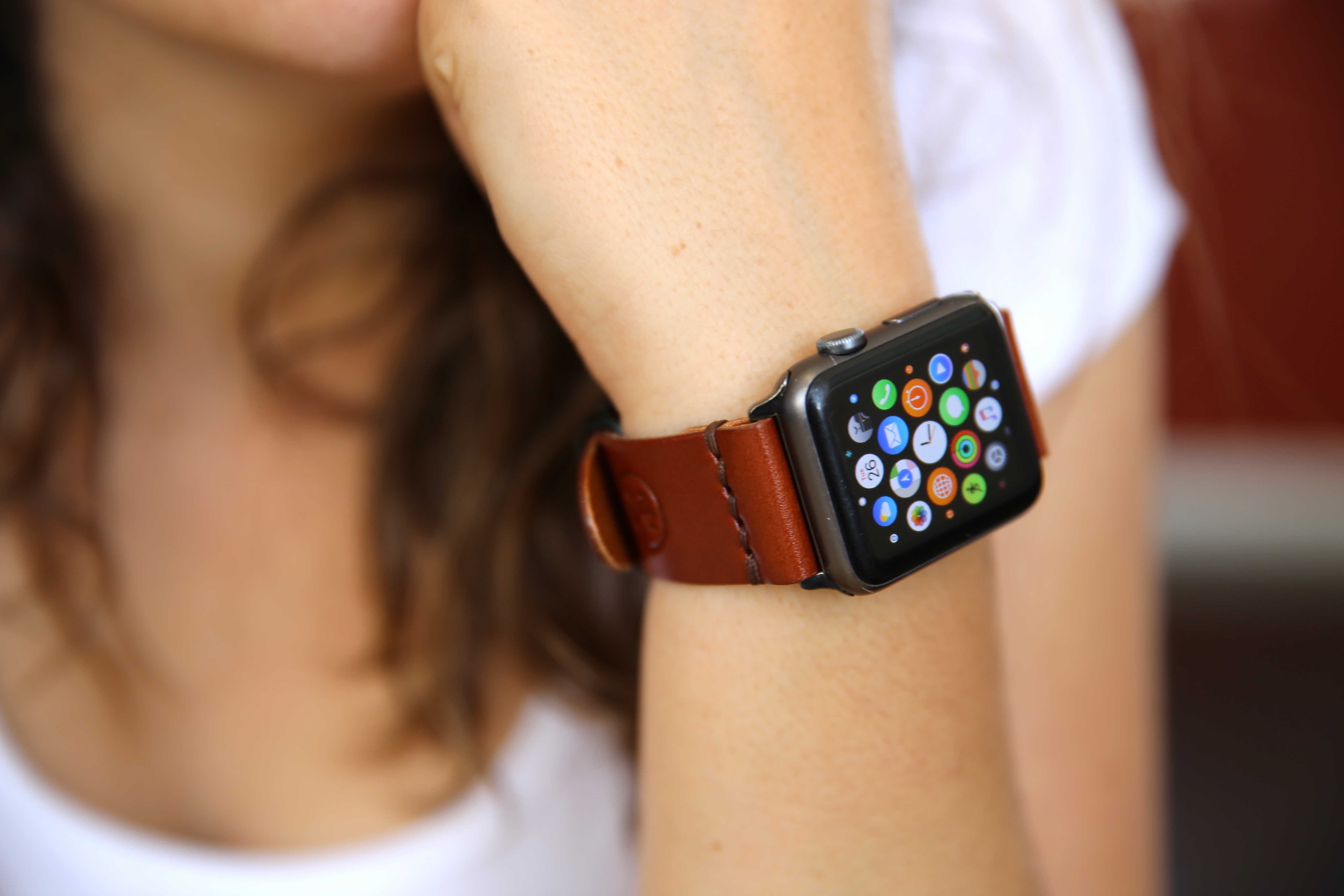 Apple Watch with brown strap