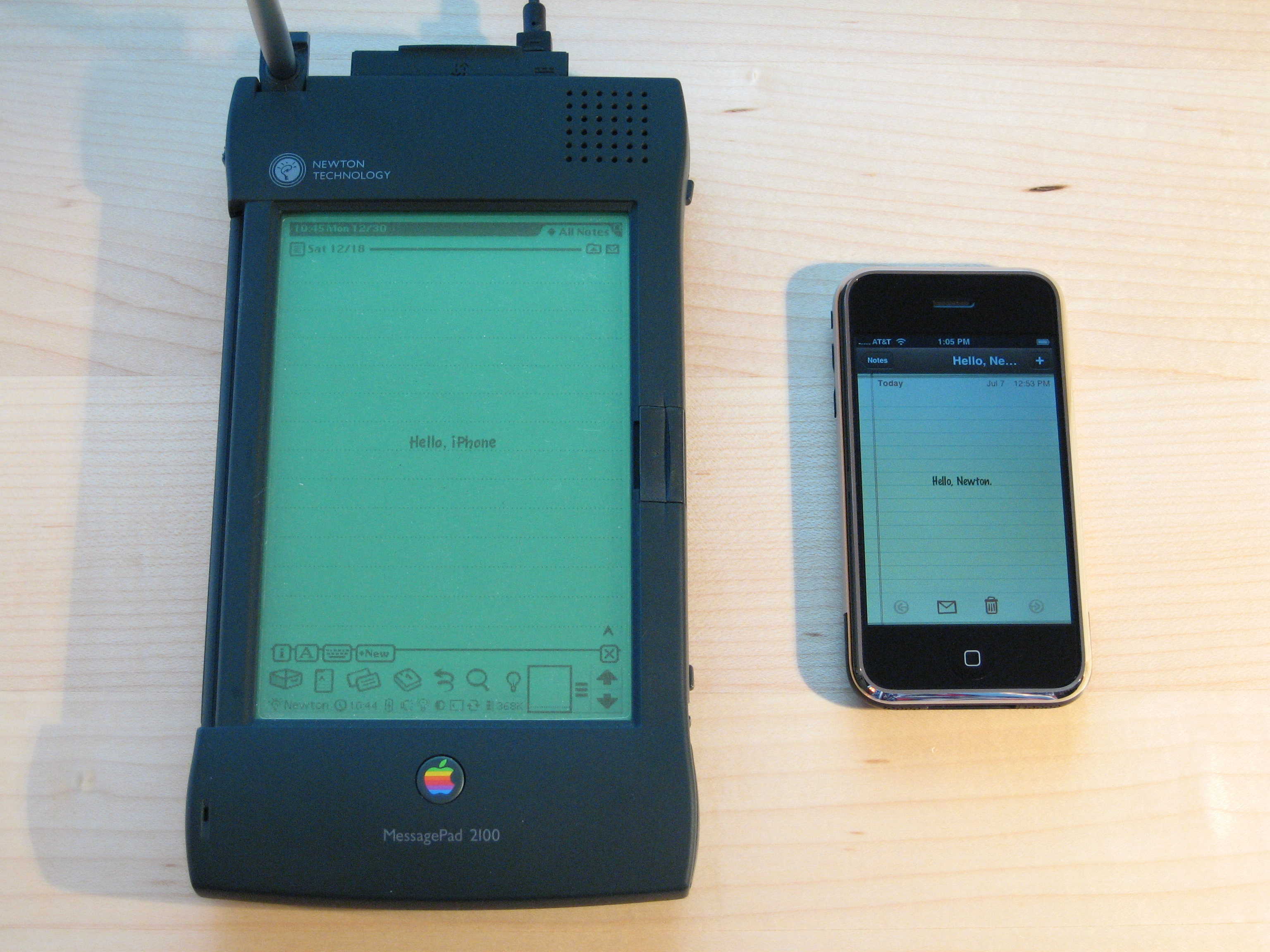 The Newton MessagePad looks gigantic next to an iPhone.