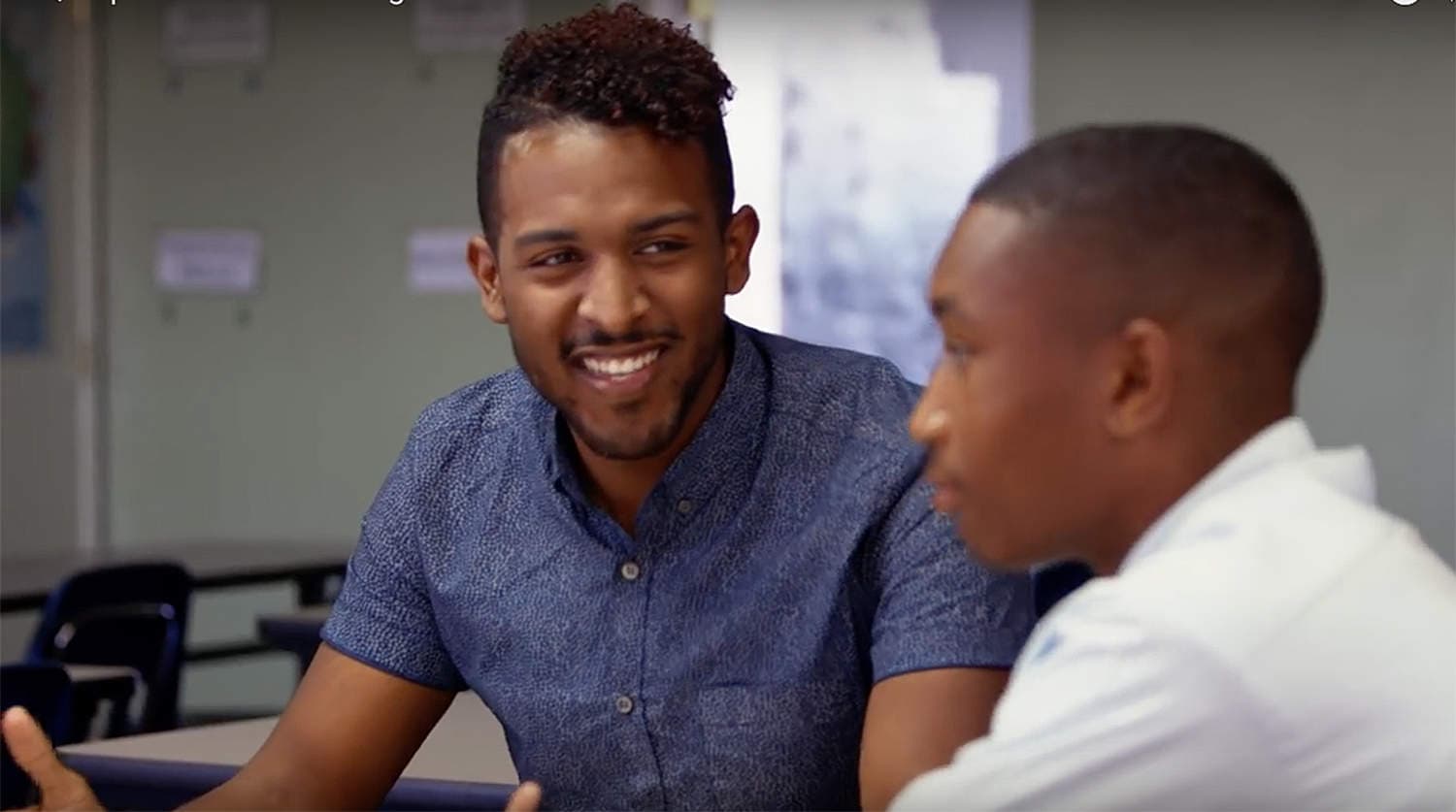 RISE High co-founder Eric Whalen works with a student.