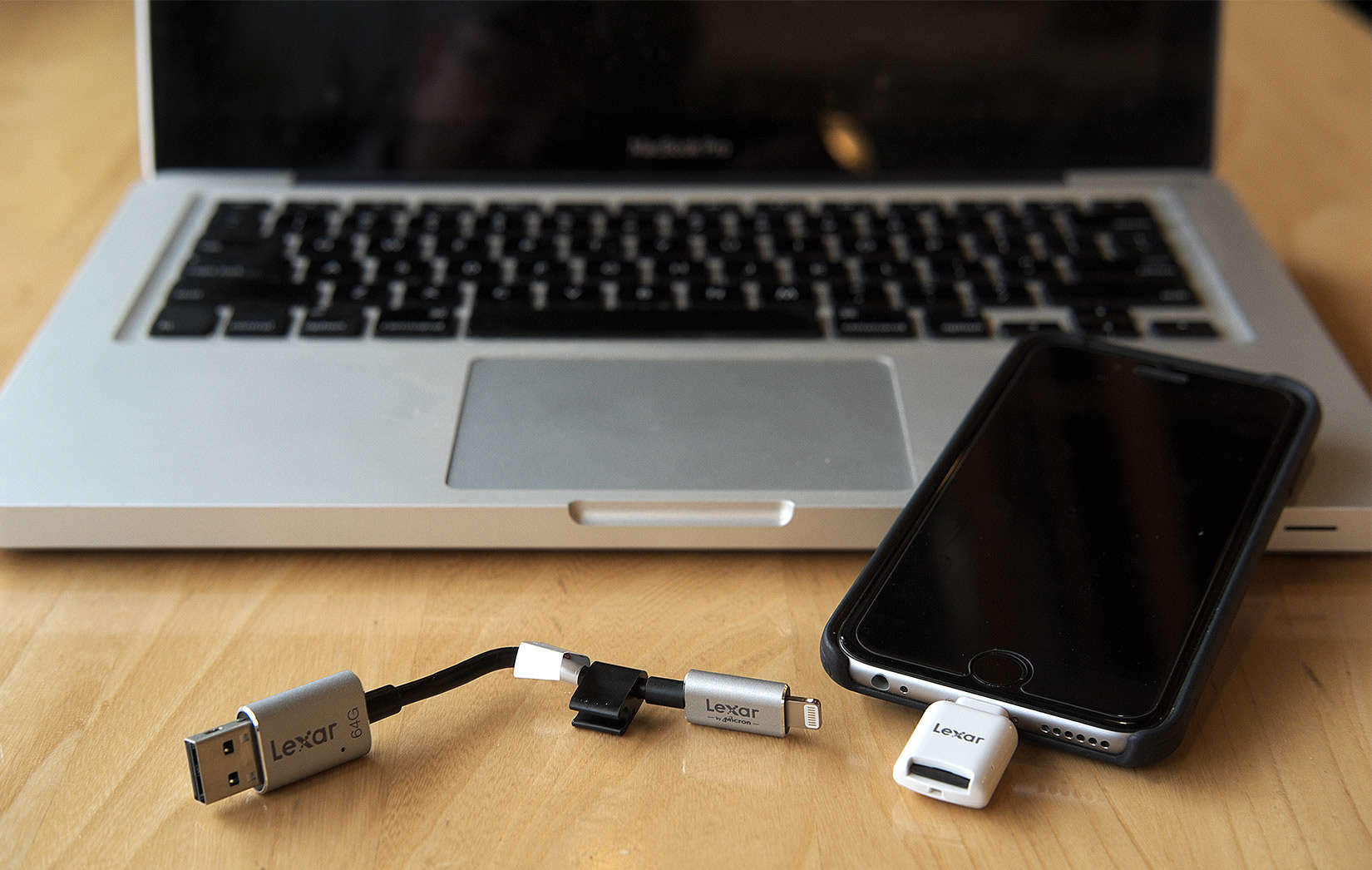 Lexar makes a microSD reader and JumpDrive that backs up your iPhone data and frees its memory.