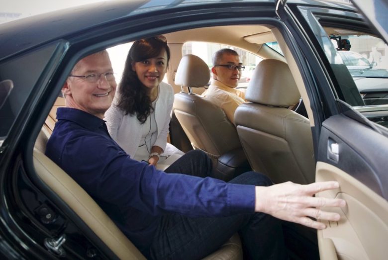 tim cook in a car