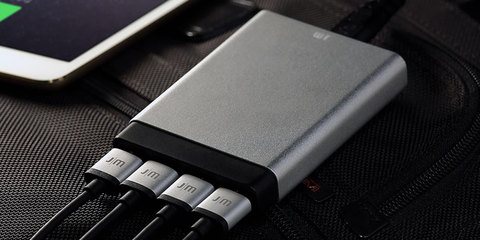 This charging block is not much thicker than a USB slot, but can charge up to 4 devices at once.