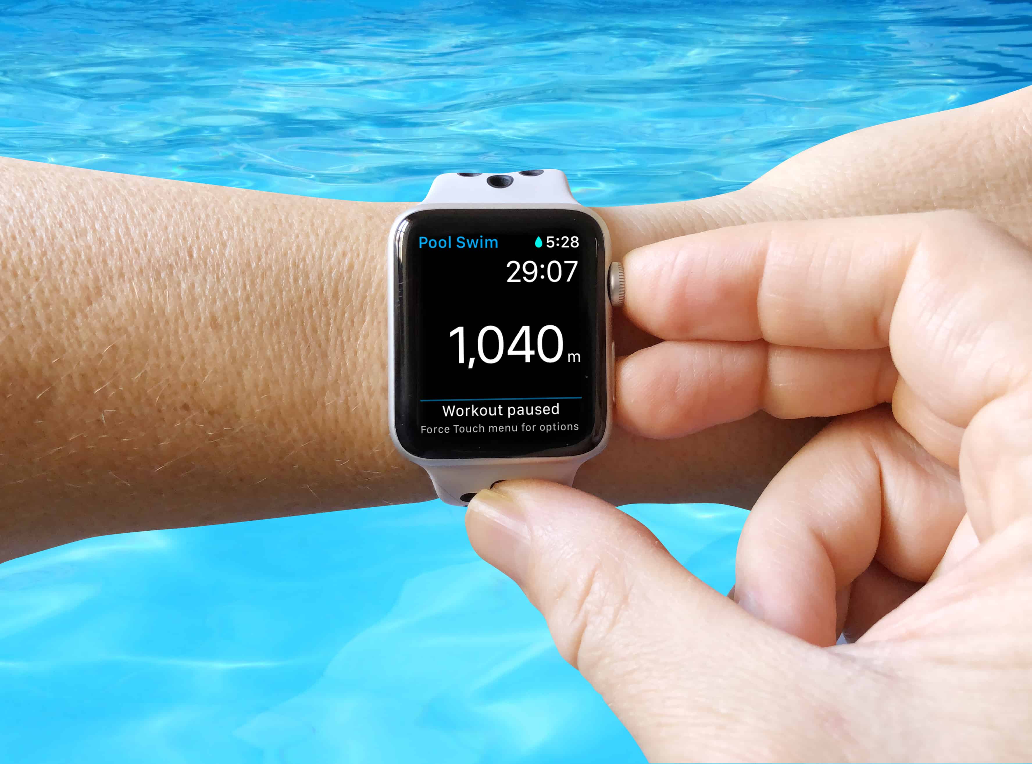 Press the Digital Crown and side button together to pause an Apple Watch swim workout when in waterproof mode.