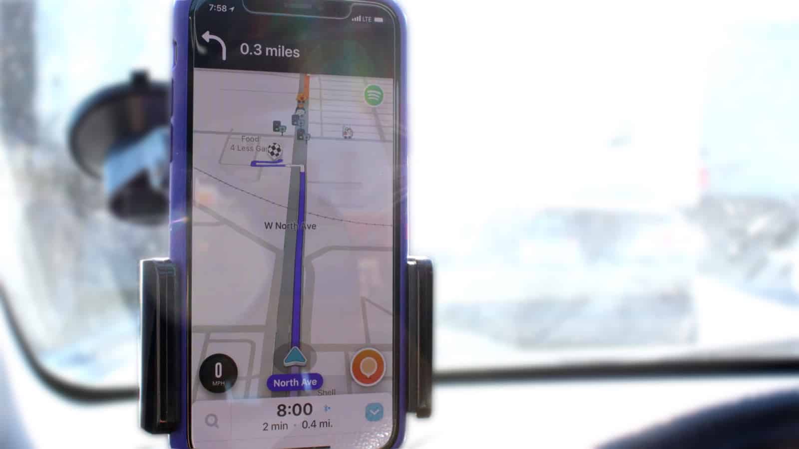 Waze on iPhone in a car GPS mount