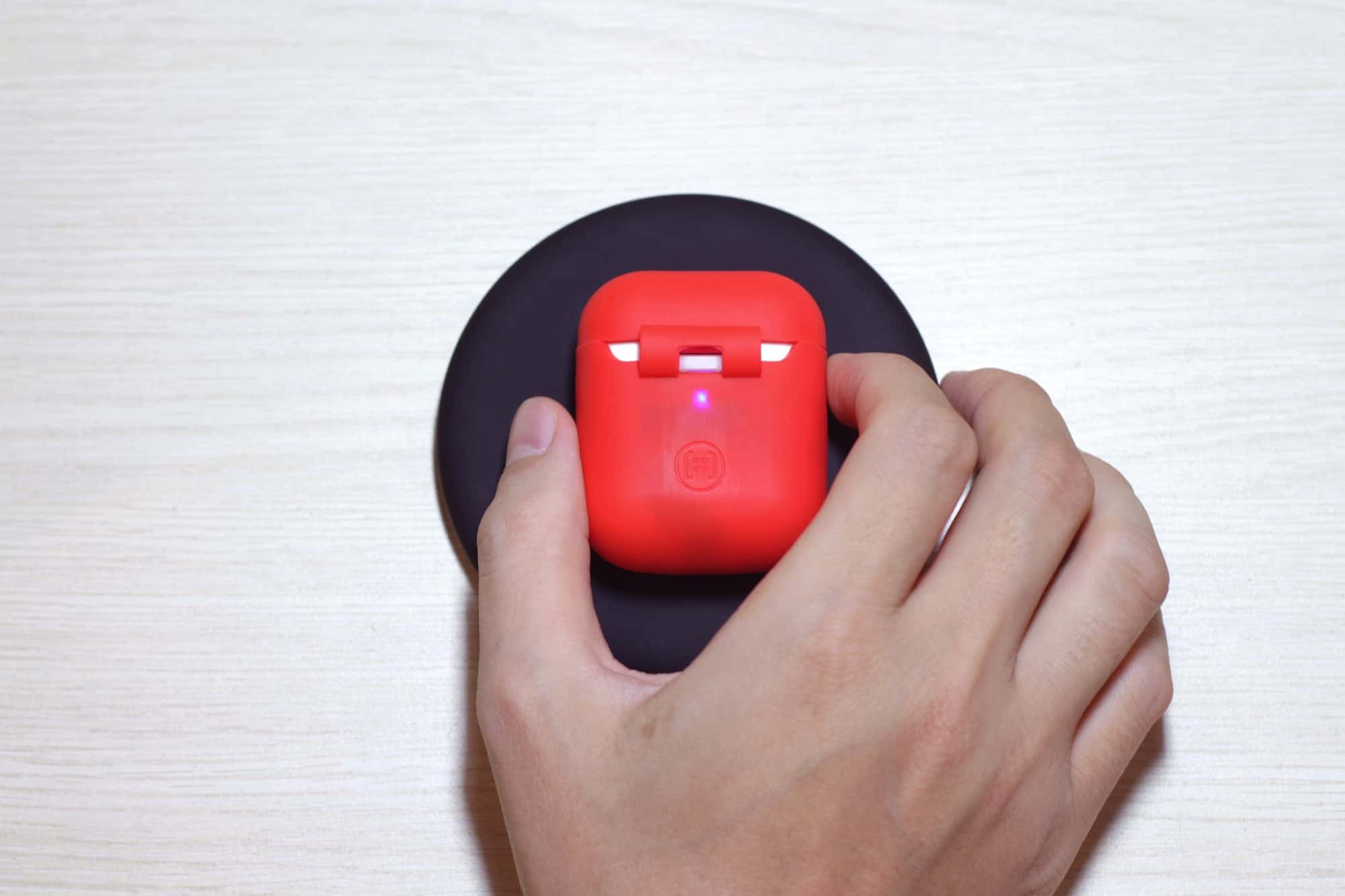 Drop the AirPlus-wrapped AirPods onto any charging mat.