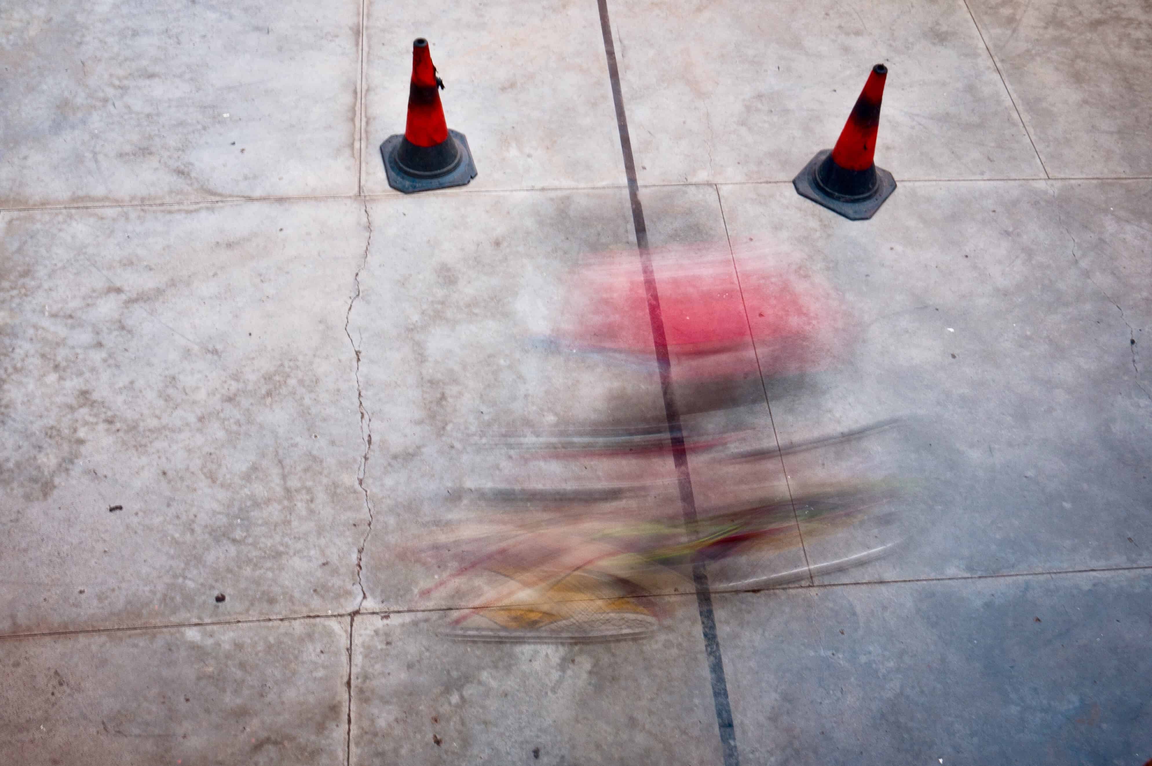 A slow shutter speed lets moving objects blur, while still elements stay sharp.