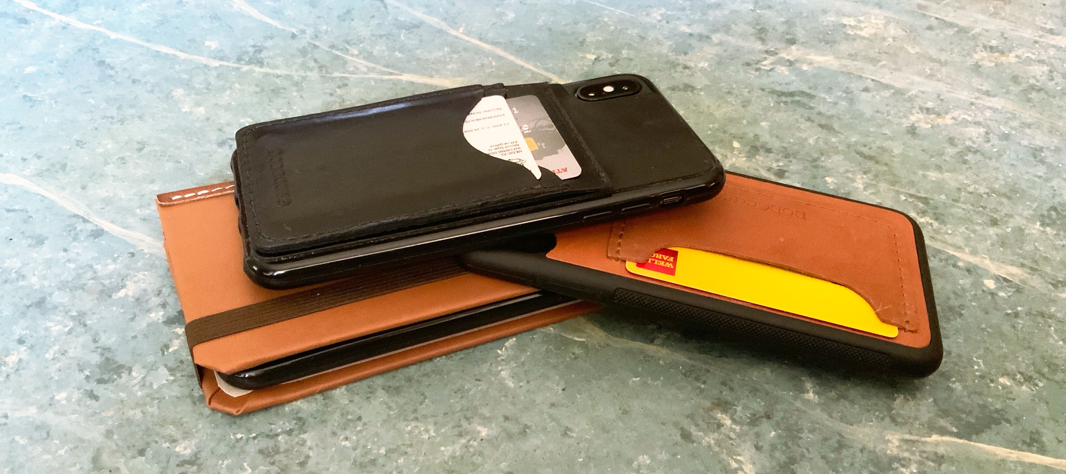 Any of these Dodocases can hold your iPhone and your credit cards, driver license, etc.