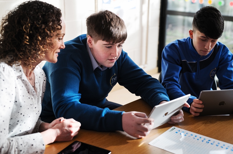 Apple volunteers teach coding at a disadvantaged high school in Ireland.