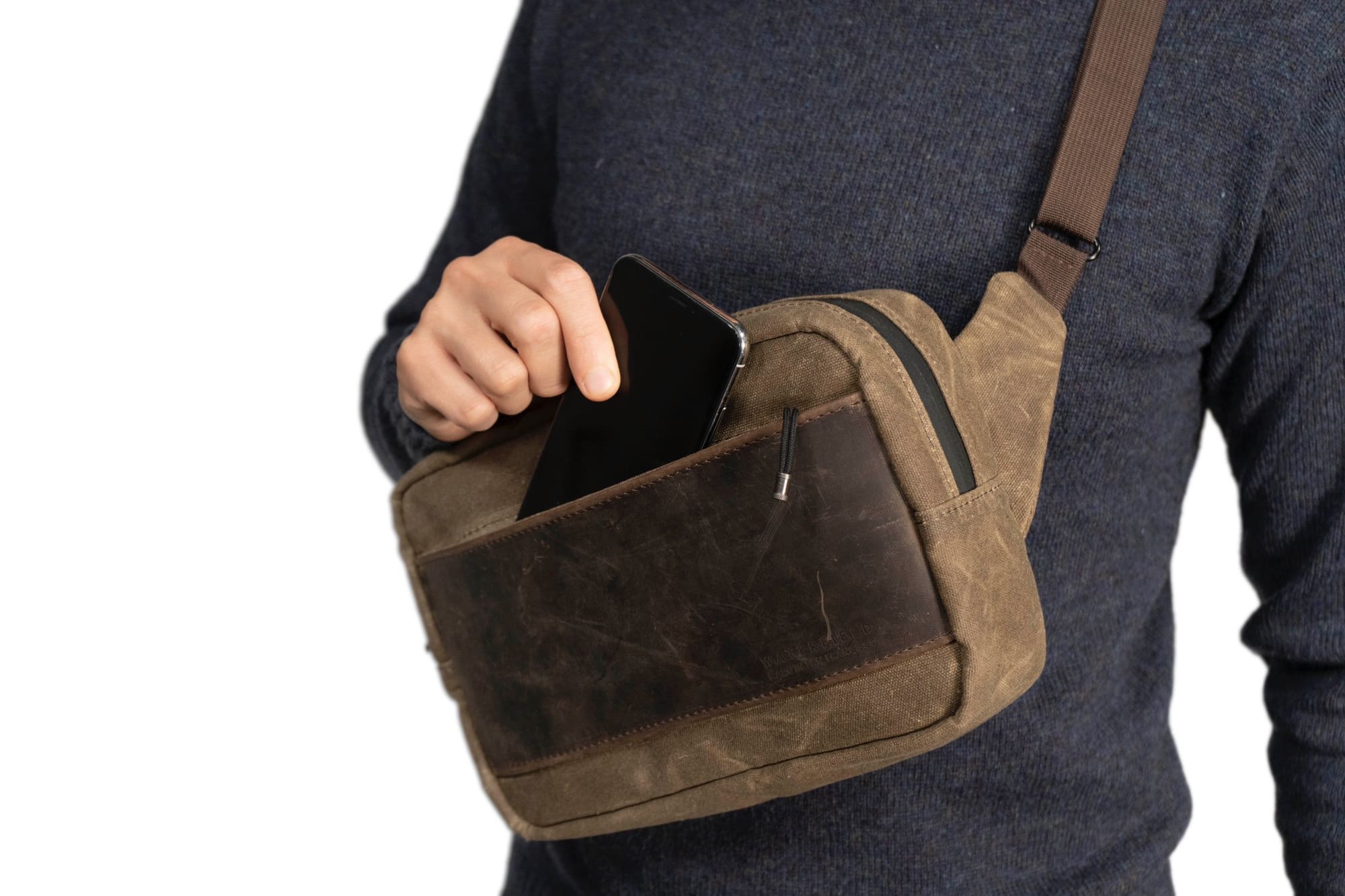 There’s even a spot in the WaterField Sutter Sling Pouch for your iPhone.