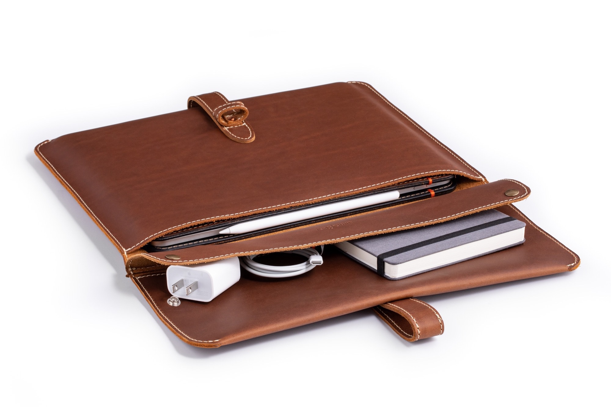 Both the main section and the pocket remain accessible when the Oxford iPad Sleeve sits flat on the desk.