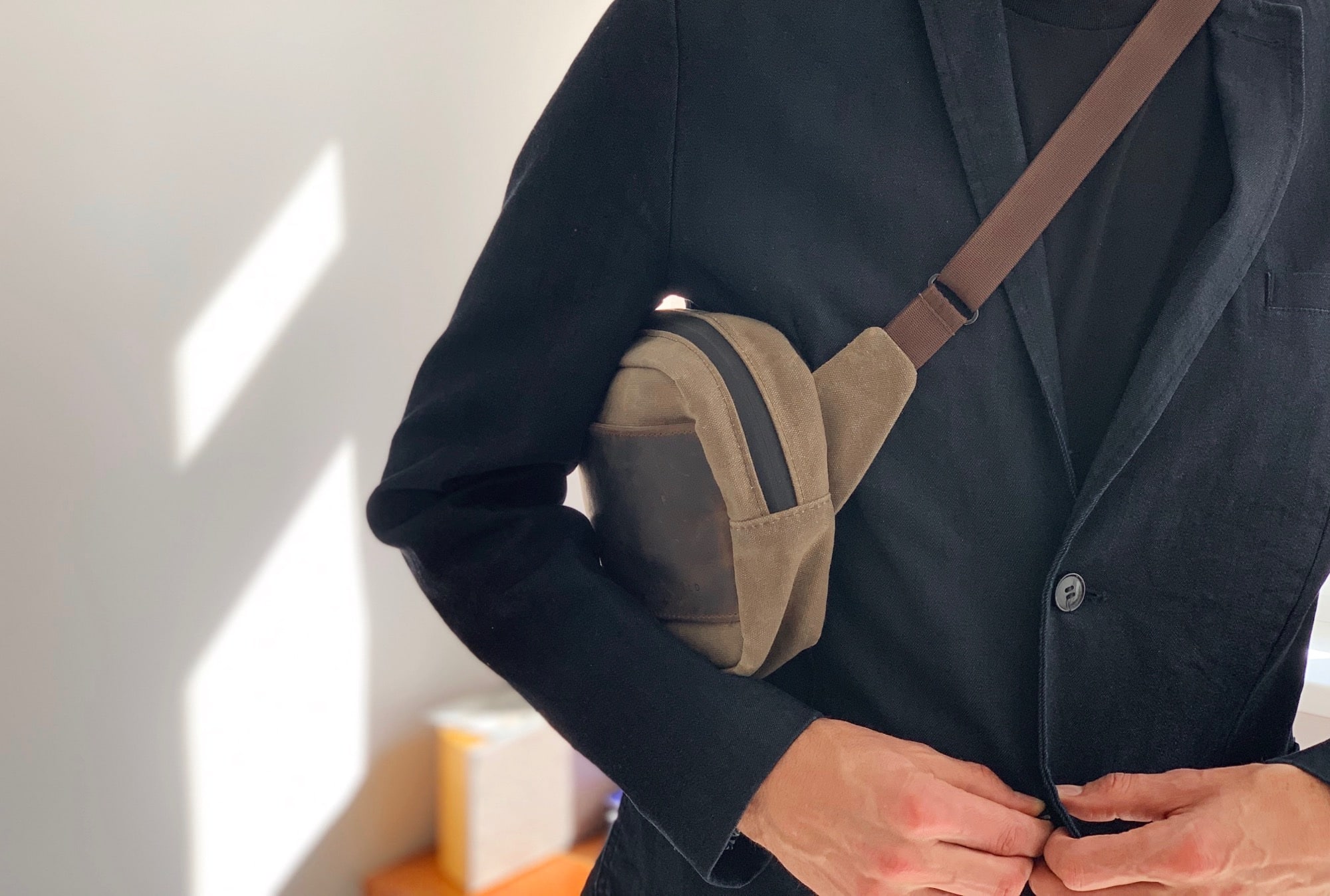 The Sutter Sling Pouch is happy crammed up under your armpit.