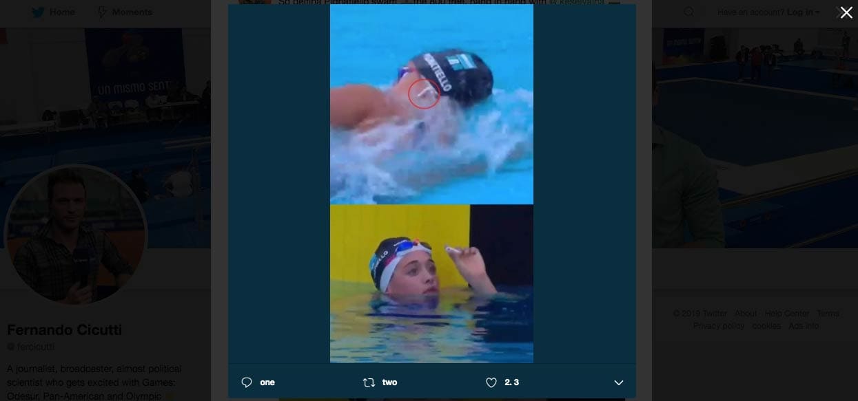 Swimmer races with AirPods