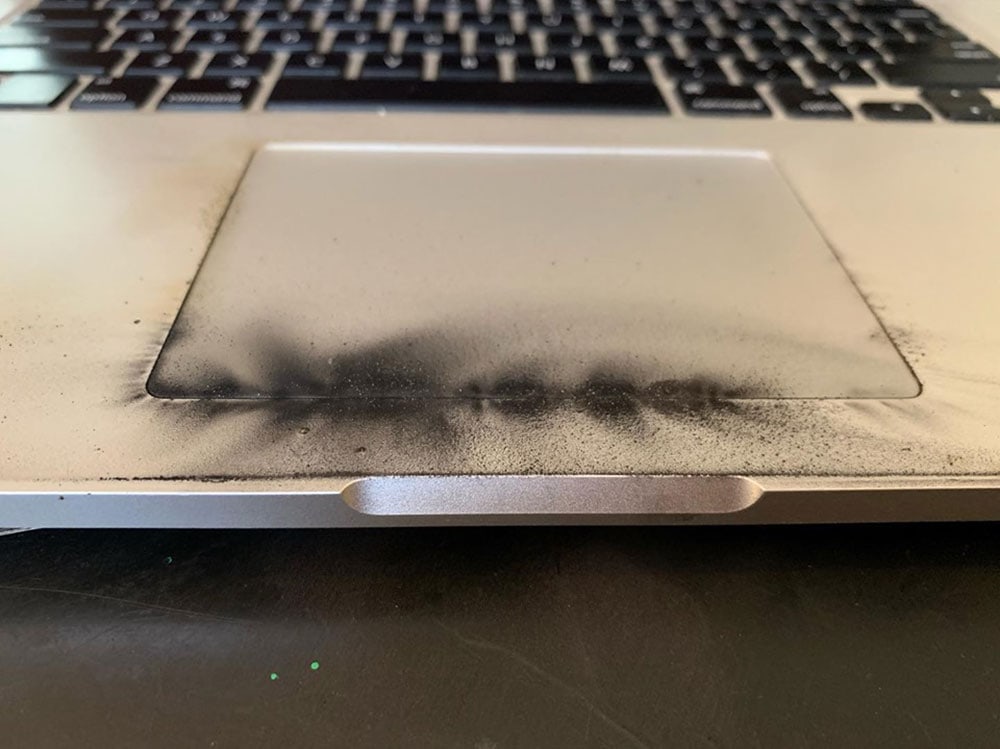 A bad battery caused this charred touchpad on a recalled 2015 MacBook Pro.