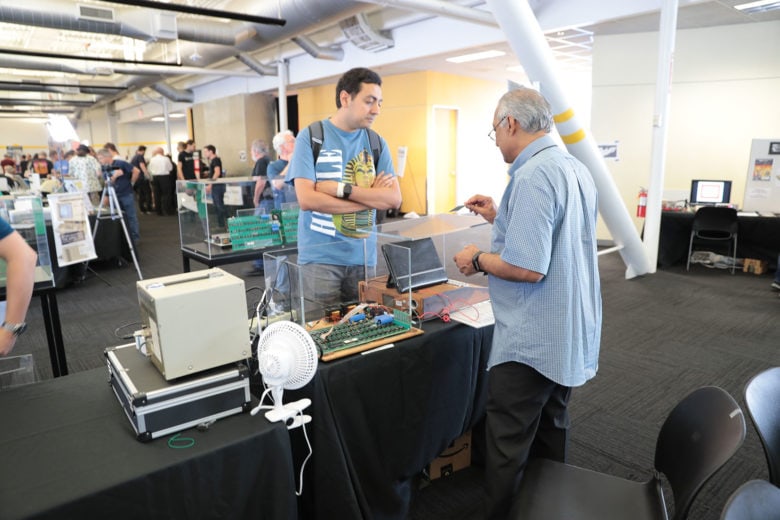 A demonstrator at the Apple 1 exhibit at Vintage Computer Festival West 2019