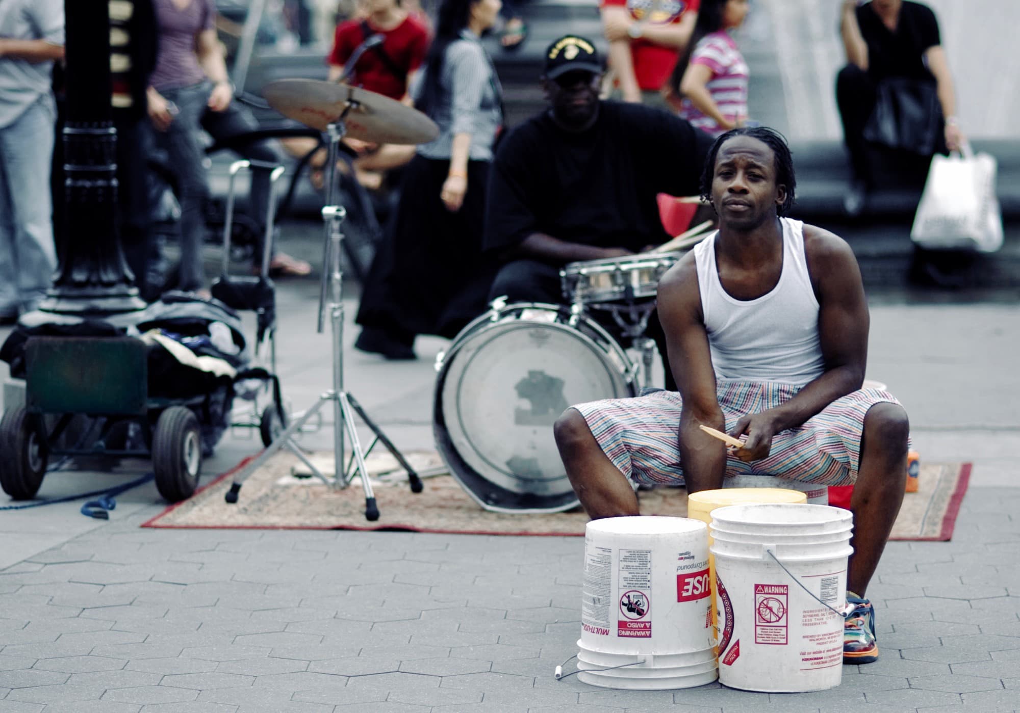 Street drummer with buckets