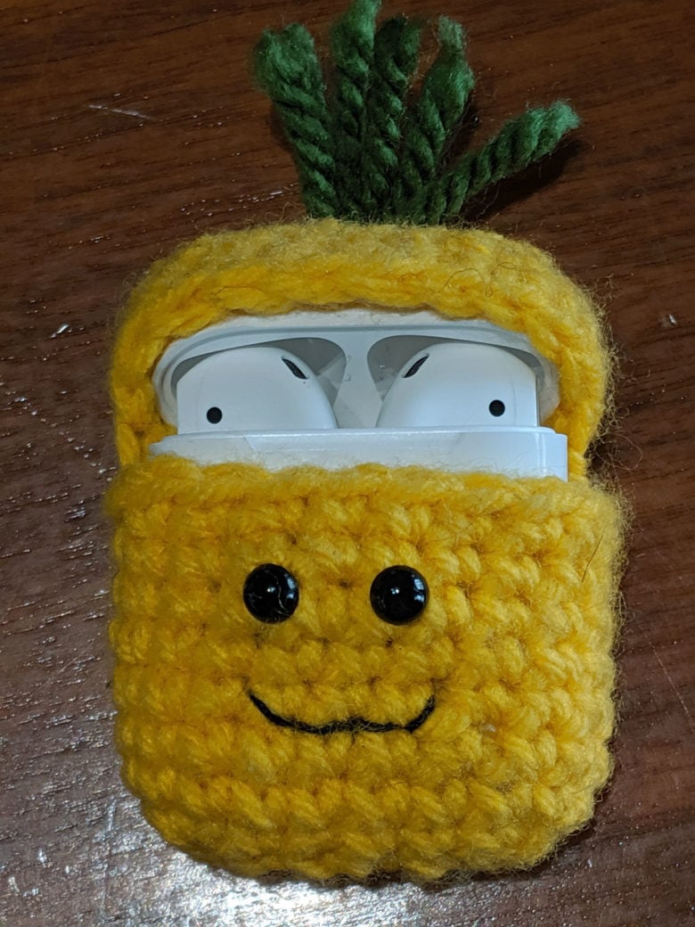 Crochet airpods covers This crochet AirPods cover looks like a pineapple