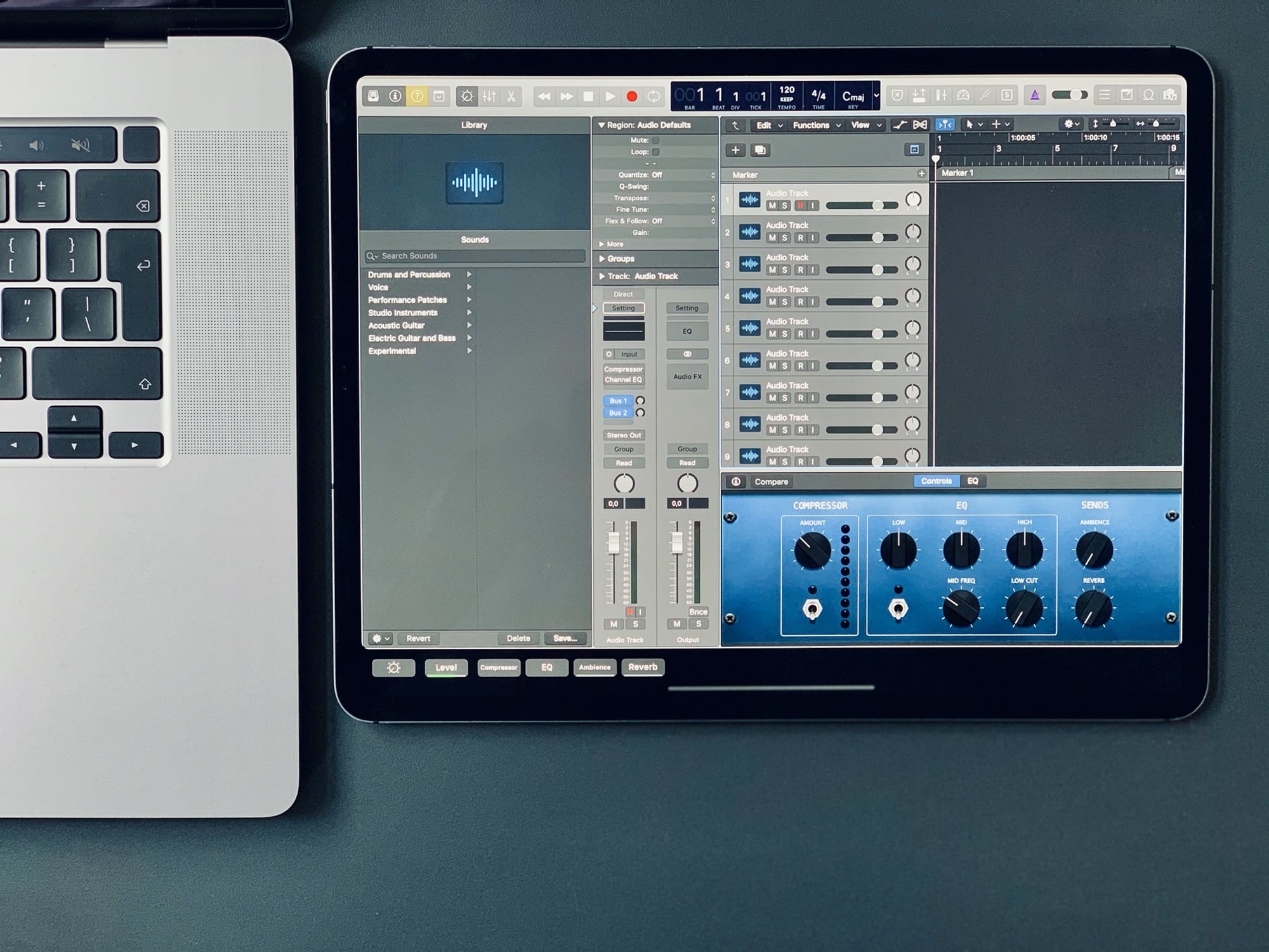 Yes, that's Logic Pro X 'running' on an iPad.