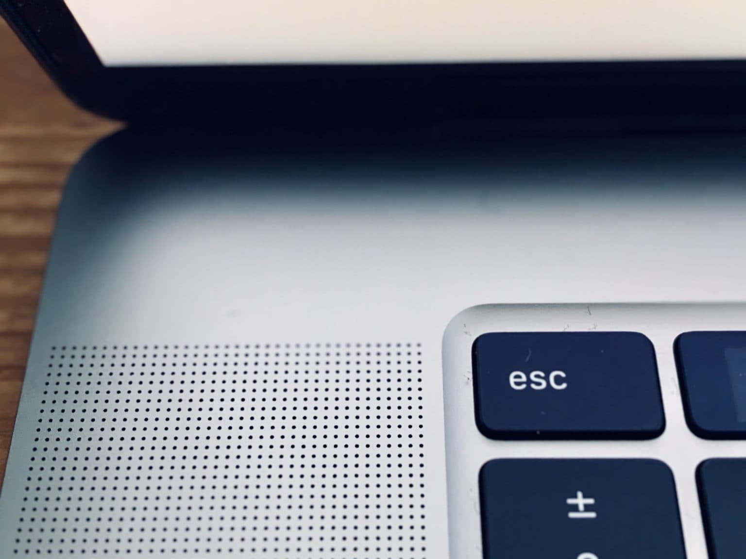 Apple added an Escape button, but broke the speakers. Find out how to fix MacBook Pro clicking speakers.