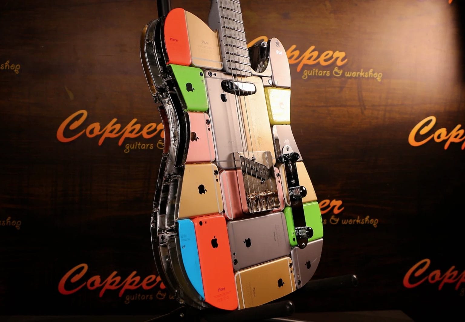 This custom iPhone guitar from Copper Guitars is the most rockin' iPhone mod ever.