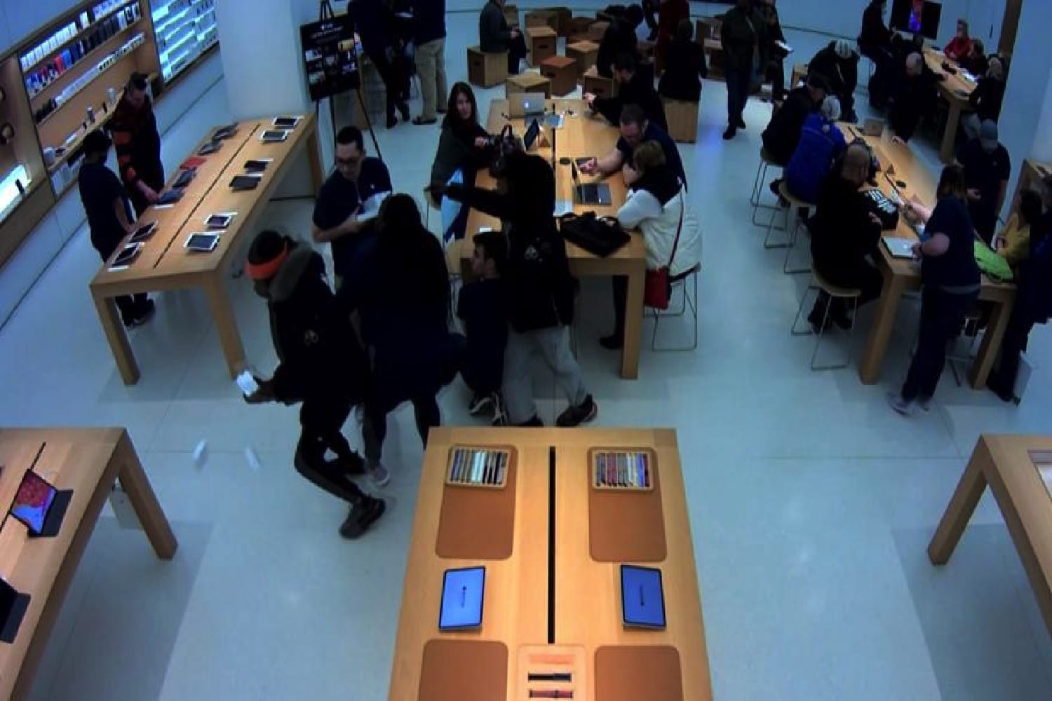 A security camera image from the Mayfair Apple Store in Wauwatosa, Wisconsin, shows alleged thieves in action.