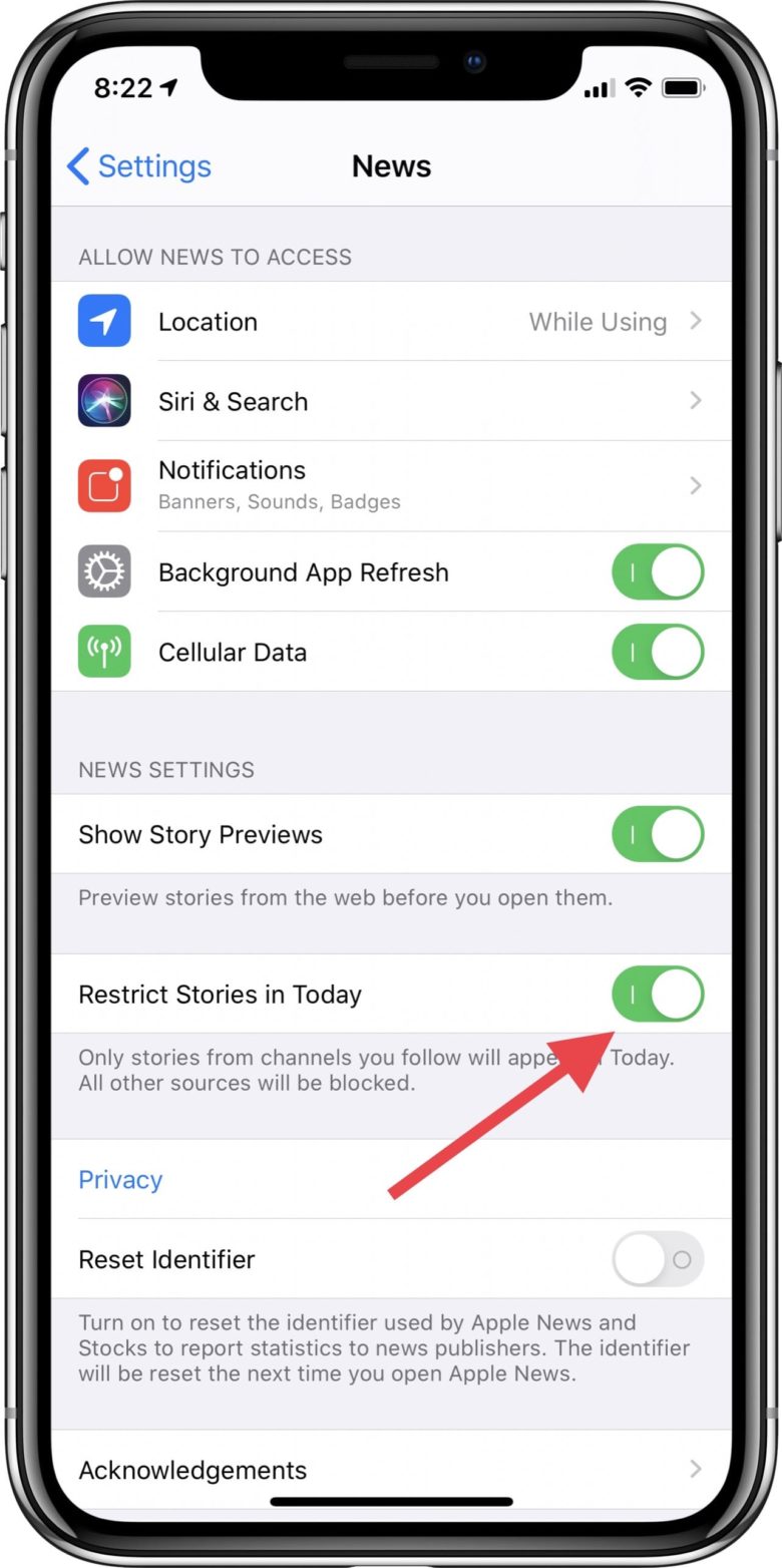 Apple News app settings with arrow pointing to restrict stories toggle