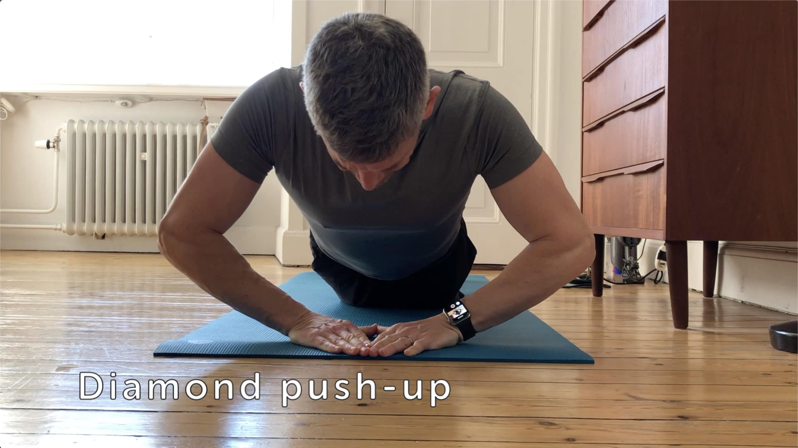 Bring your hands together for a more challenging pushup.