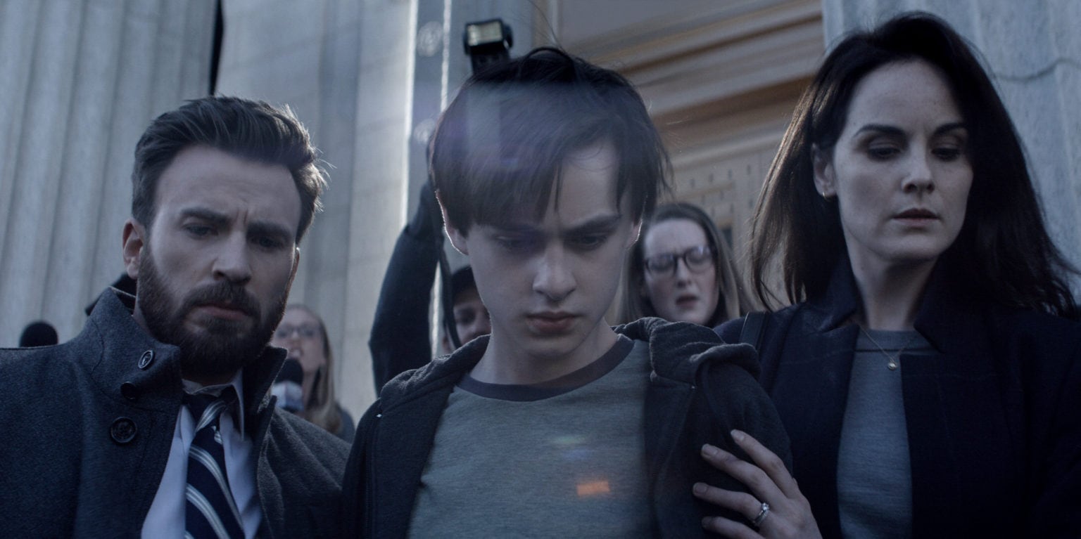 Chris Evans, Jaeden Martell and Michelle Dockery portray a family fighting suspicion in Defending Jacob.