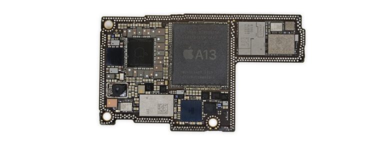 The iPhone 11 motherboard prominently includes the A13 chip.