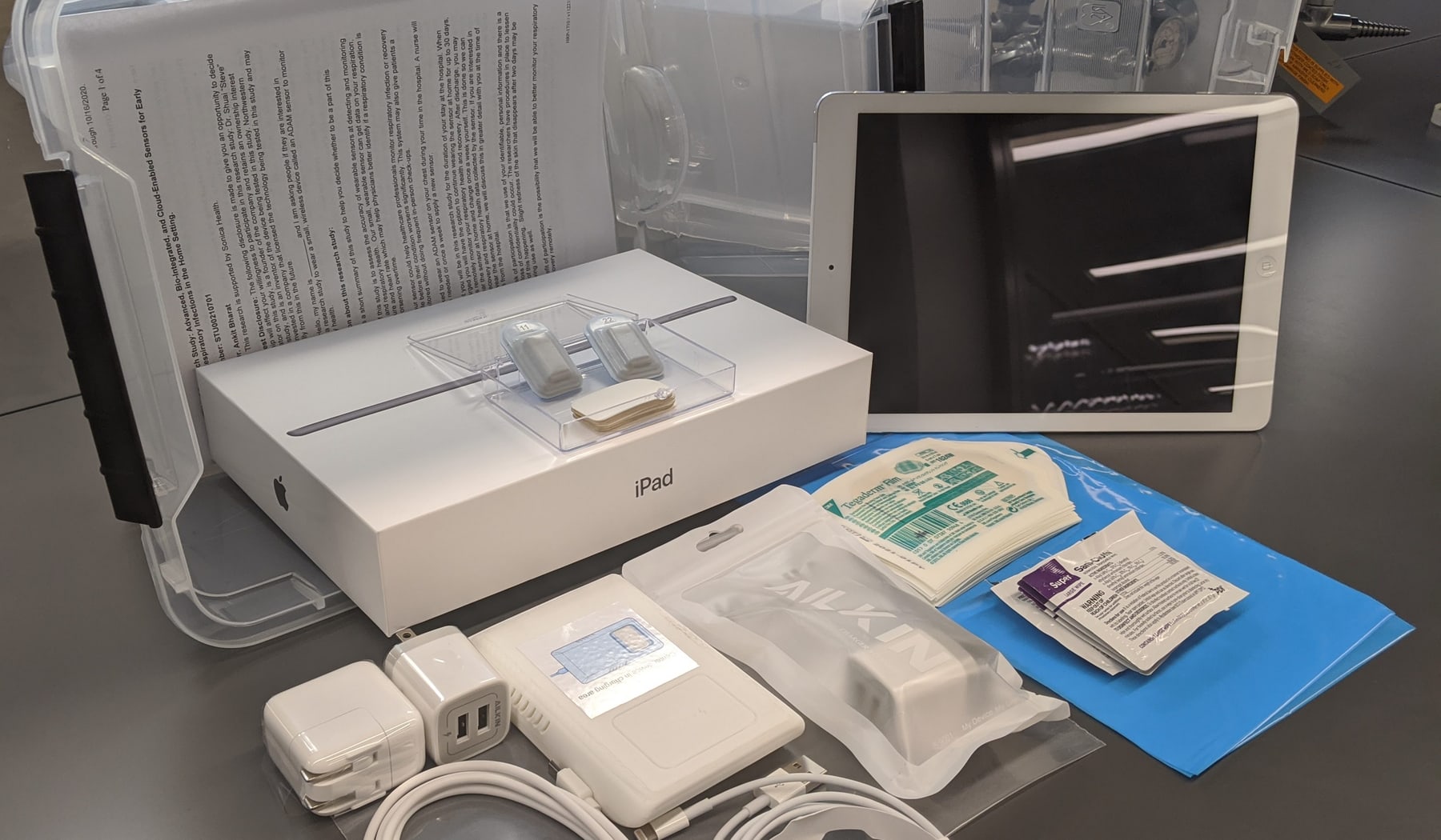 Band.aid.style.wearable.coronavirus.2 The adhesive sensor uses an iPad to analyze data for COVID-19 symptoms