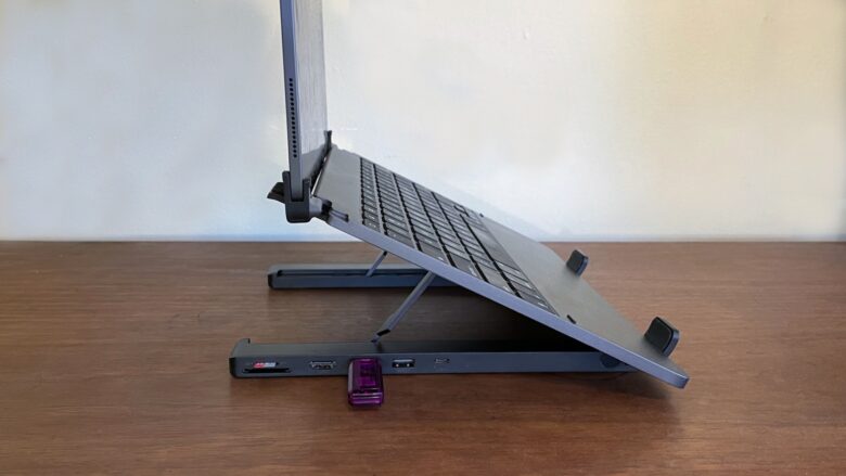Ugreen X-Kit stand holds up your laptop keyboard, and you can plug various accessories into the built-in hub.