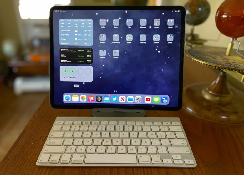 The Satechi Aluminum Desktop Stand pairs well with a full-size keyboard.