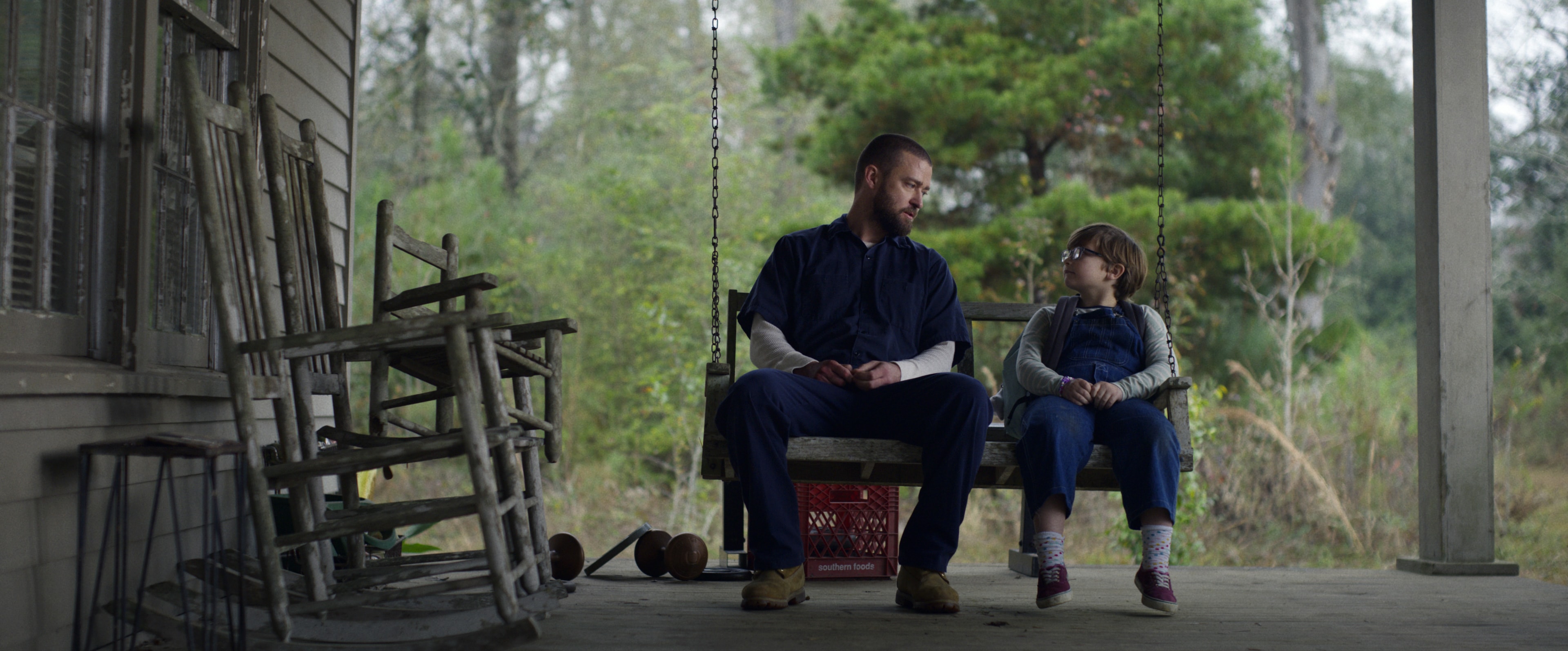 Justin Timberlake and Ryder Allen share a quiet moment in 'Palmer.'