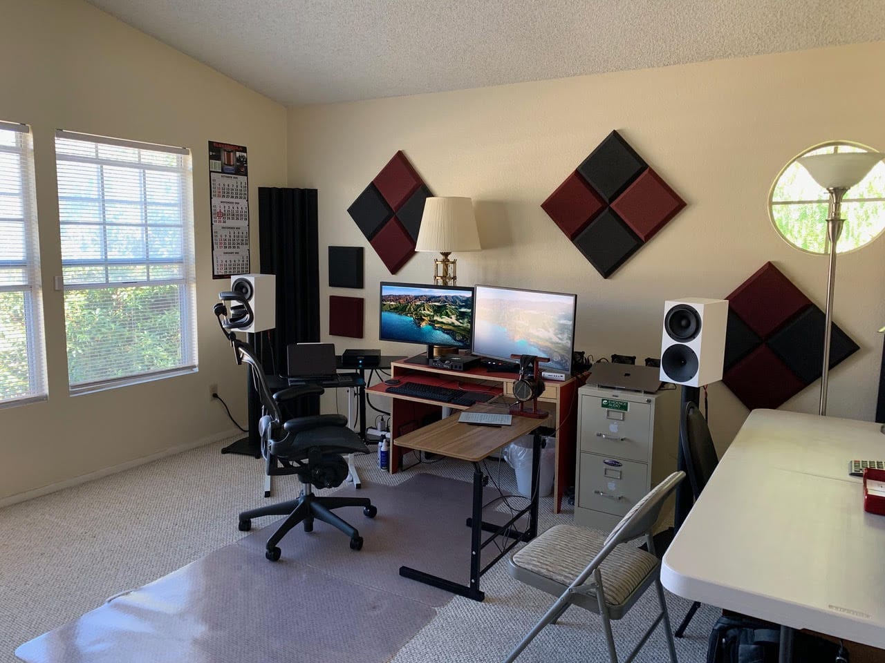 An audiophile's setup includes not just computers and a killer sound system, but sound enhancers on the walls and in corners.