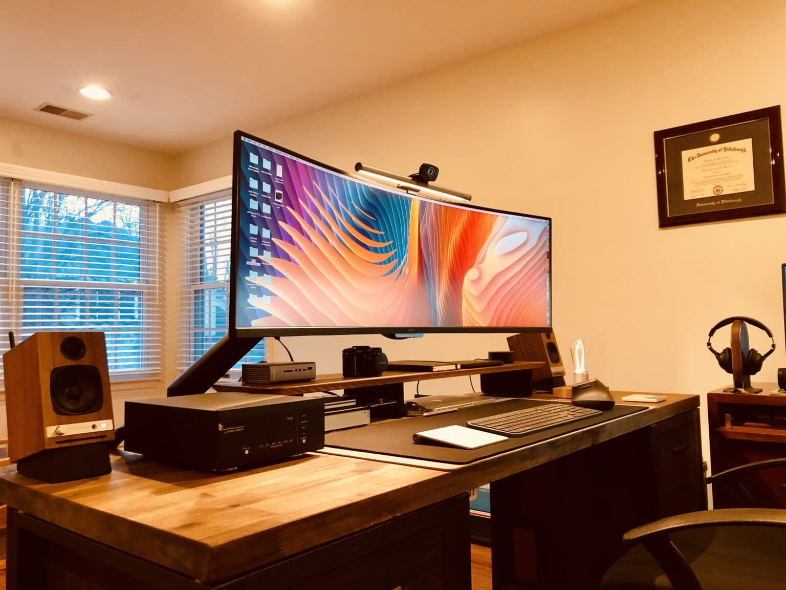 Dr. Edward Wang's setup features an ultra-wide monitor.