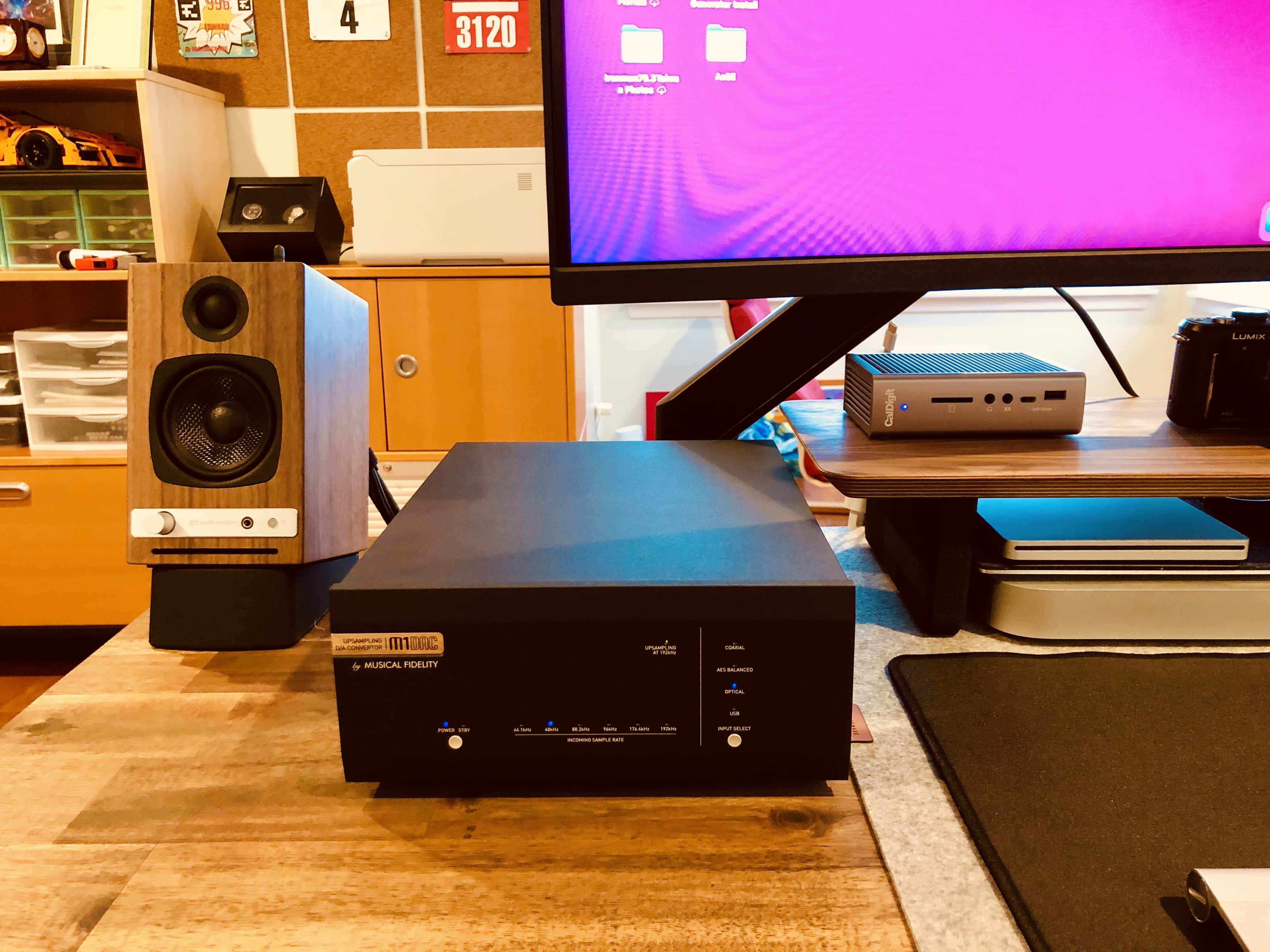 A Musical Fidelity M1DAC sits on the left side of the setup.