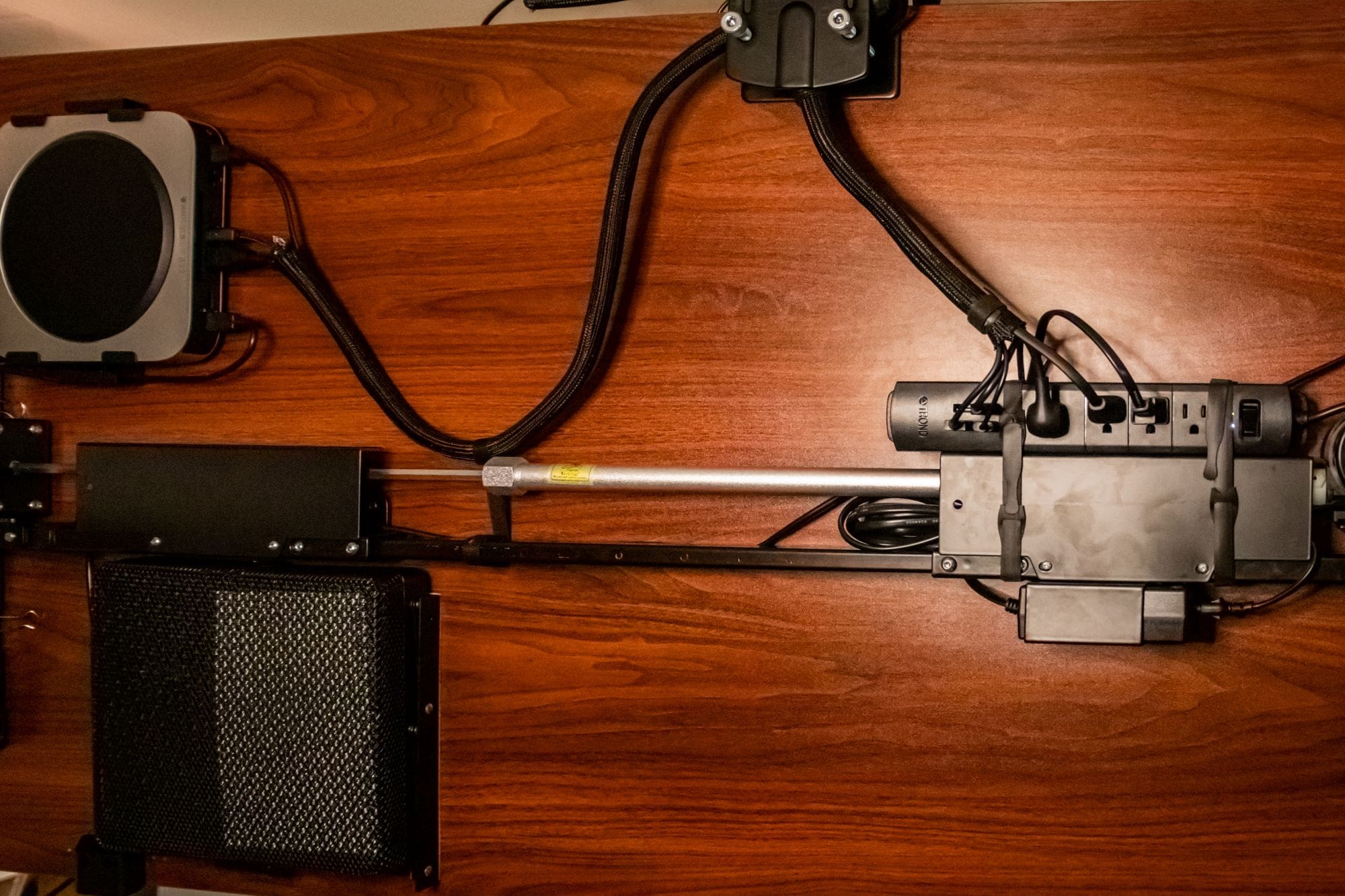 Under-desk cable management keeps the setup tidy.