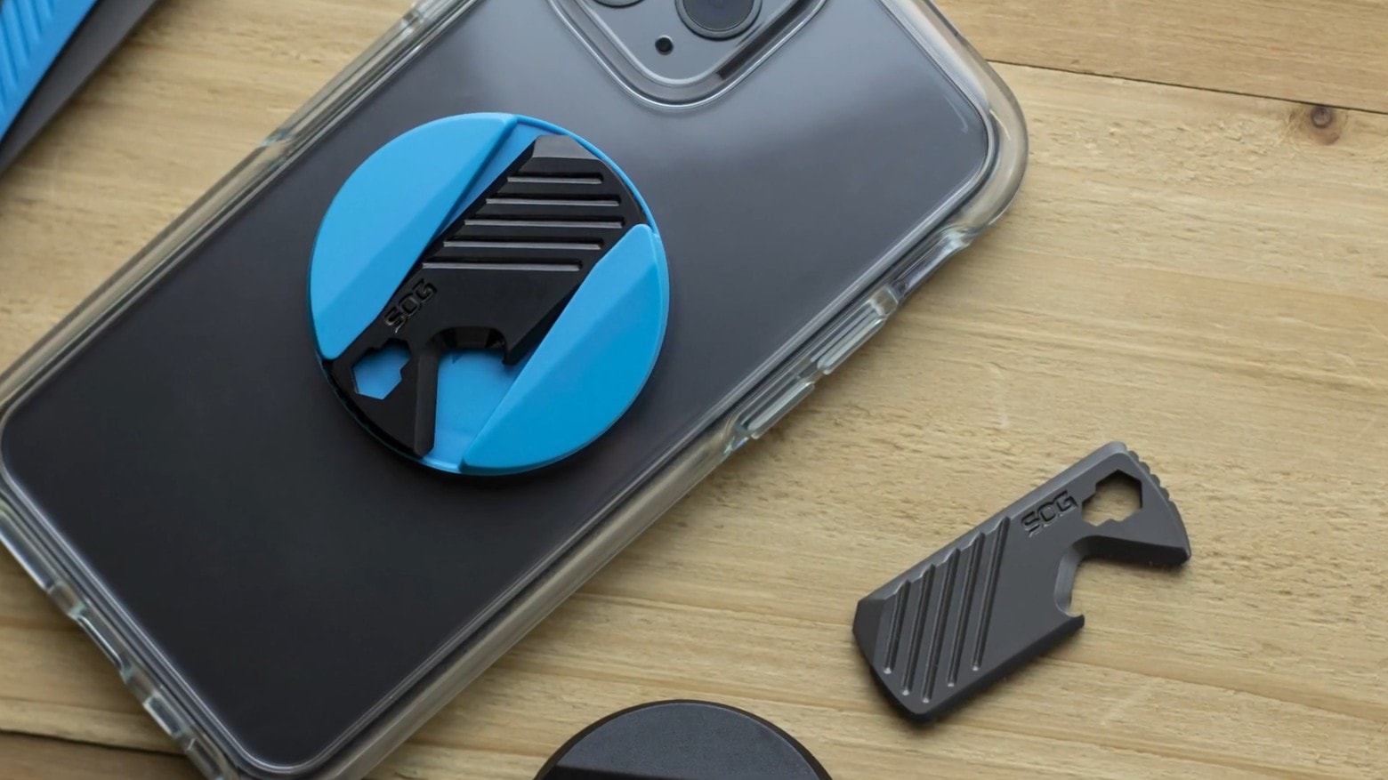 The PopGrip SOG Multi-Tool attaches a handy 5-in-1 multitool and grip to your iPhone.