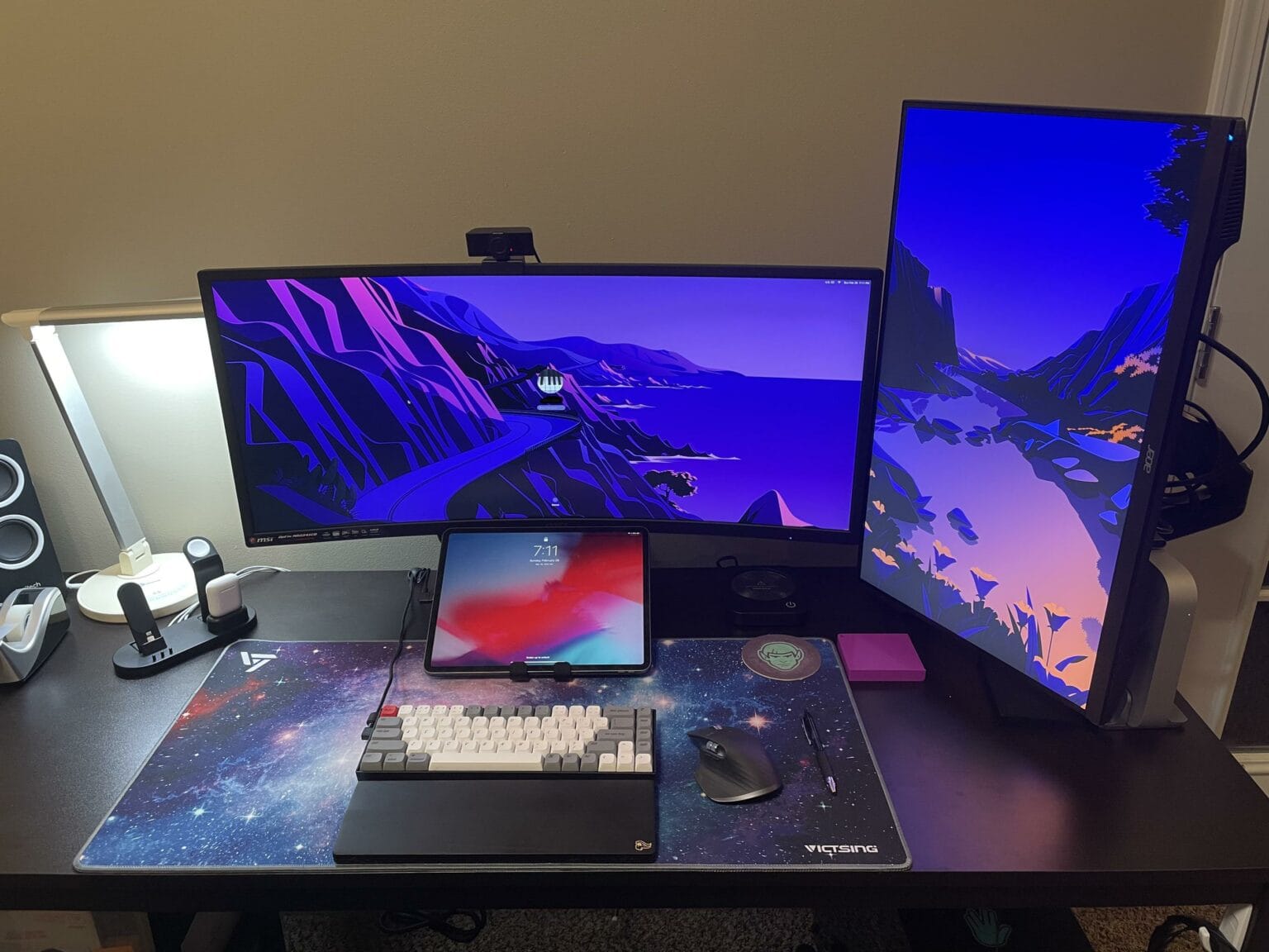 An ultrawide monitor and a vertical one can be a good look.