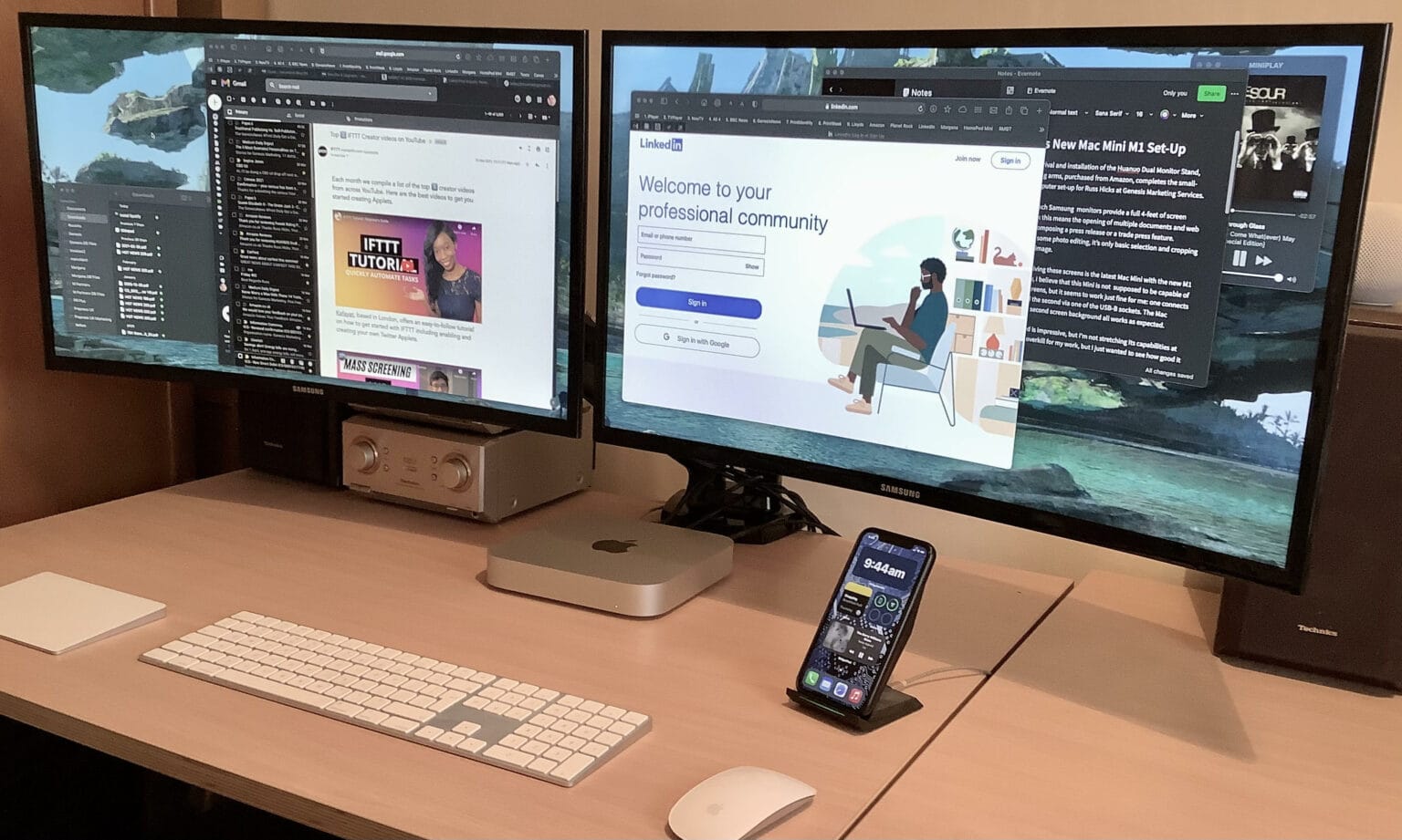 Dual curved displays and Apple keyboard, trackpad and mouse make the setup for Russ Hicks.