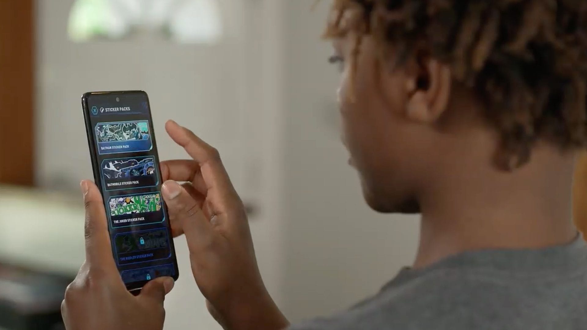 Games, comics, stickers -- the new Bat-Tech app for iOS packs a lot of fun.