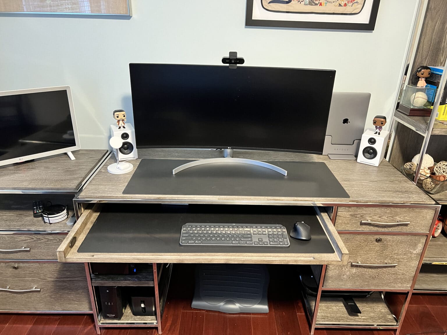 Marc Drucker's WFH setup saves some cable clutter by using the monitor as a USB hub.