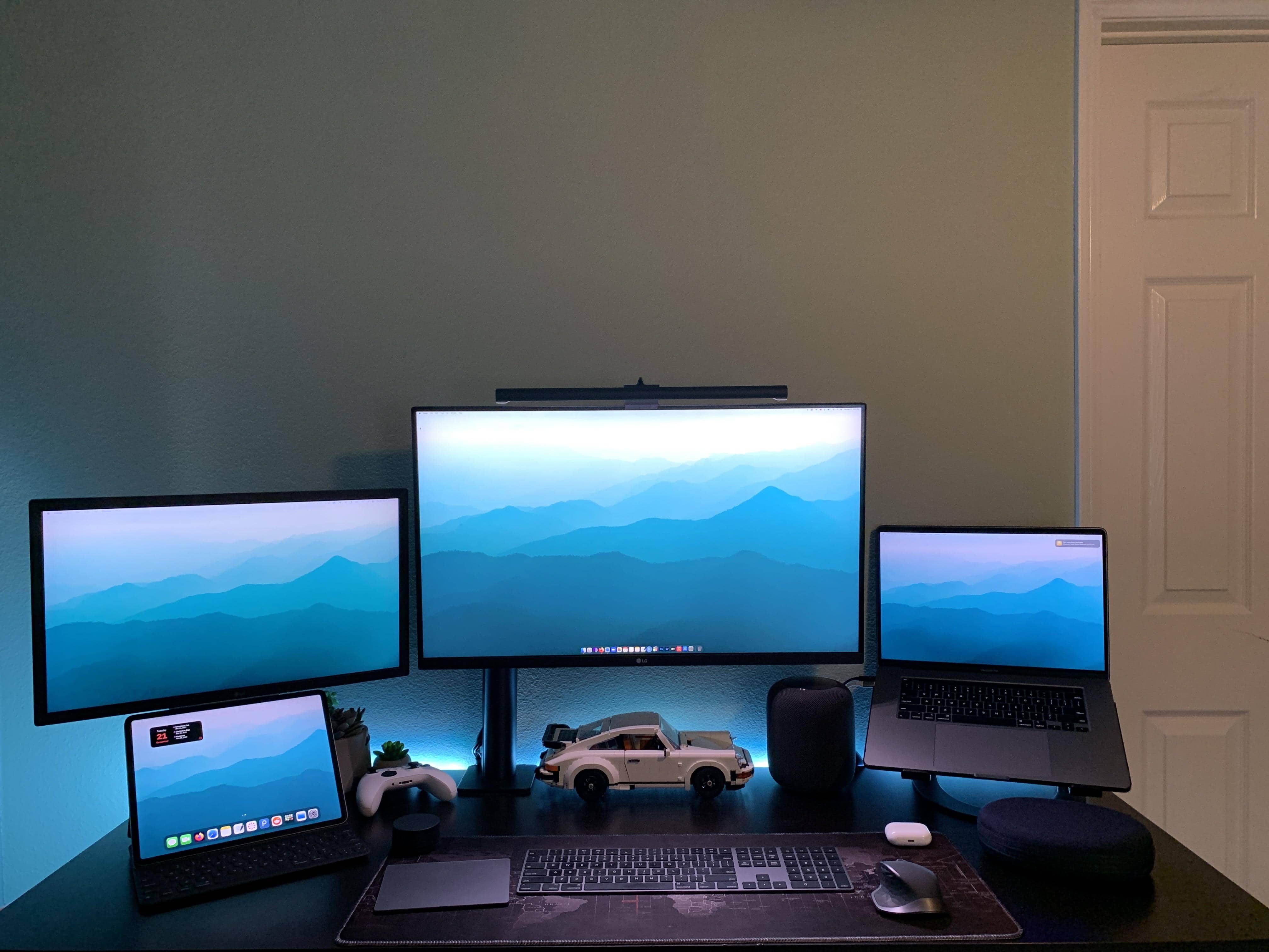 That's a sweet ride in the center, there, under the 32-inch LG monitor.