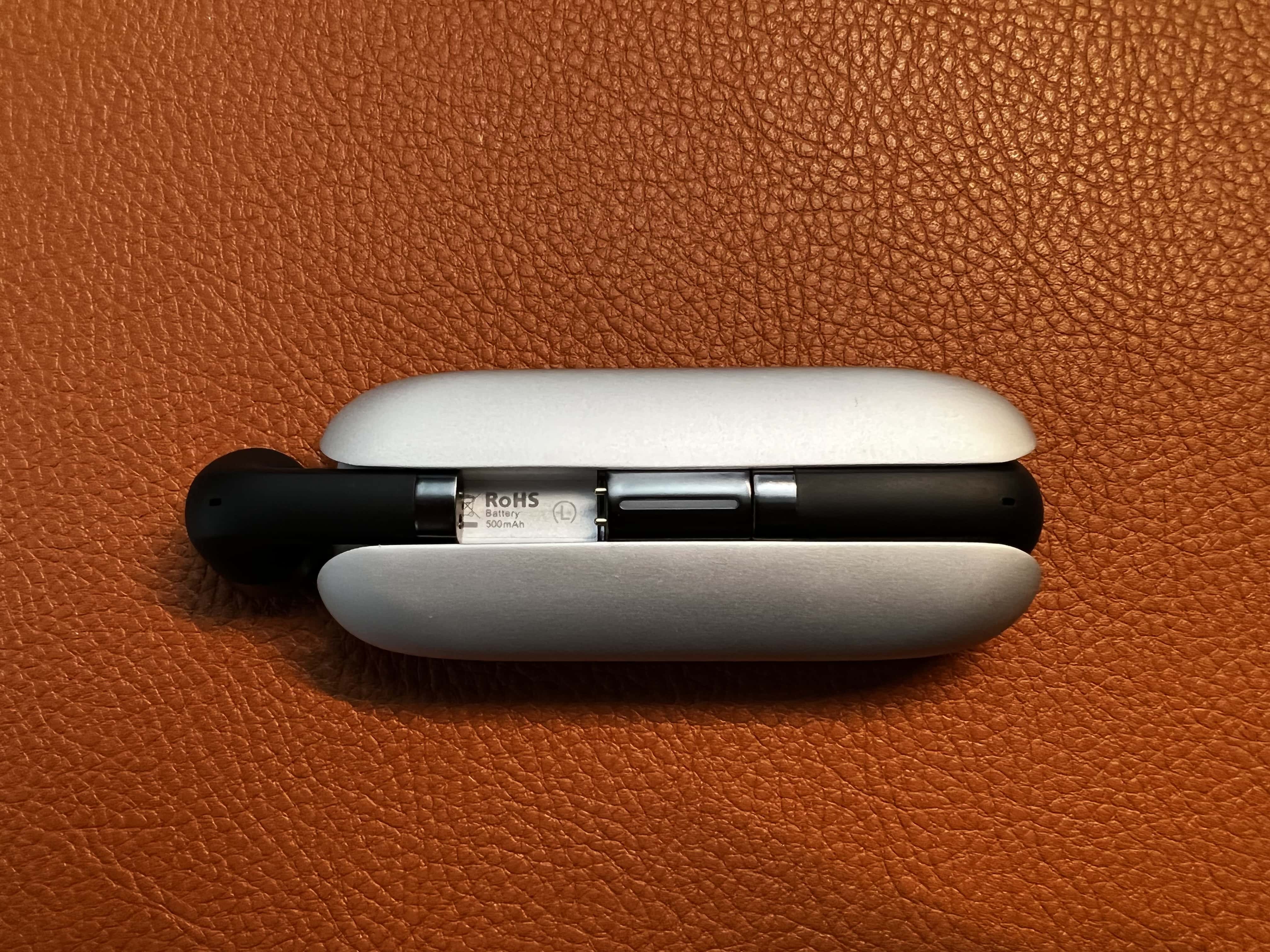 The earbuds slide into magnets on the underside of the case. 