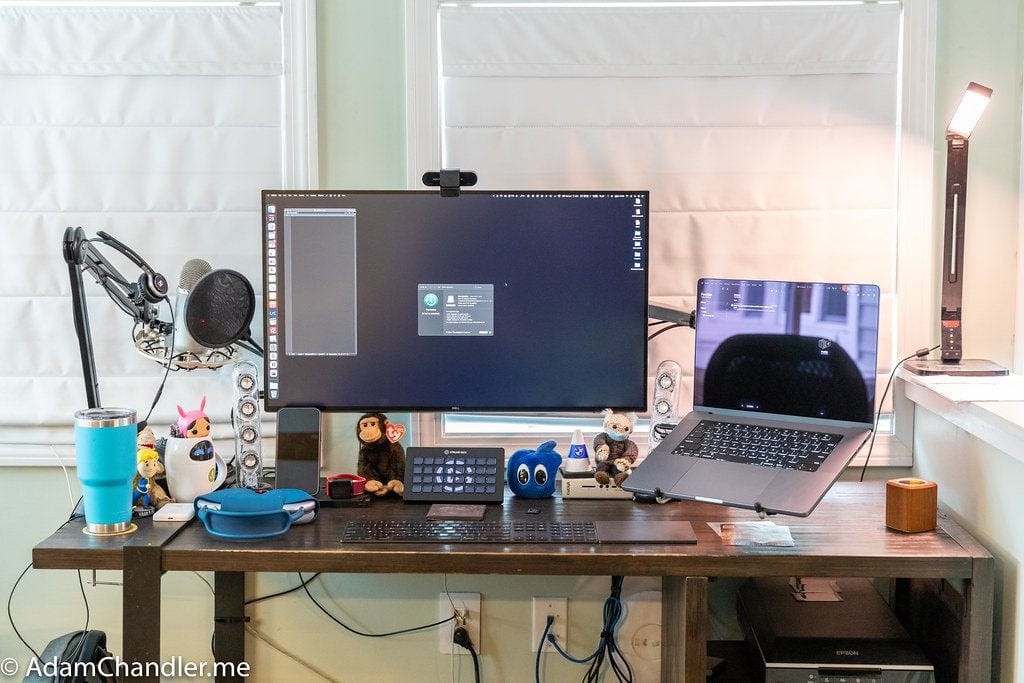 A new MacBook Pro replaced a 2019 27-inch iMac in this setup.