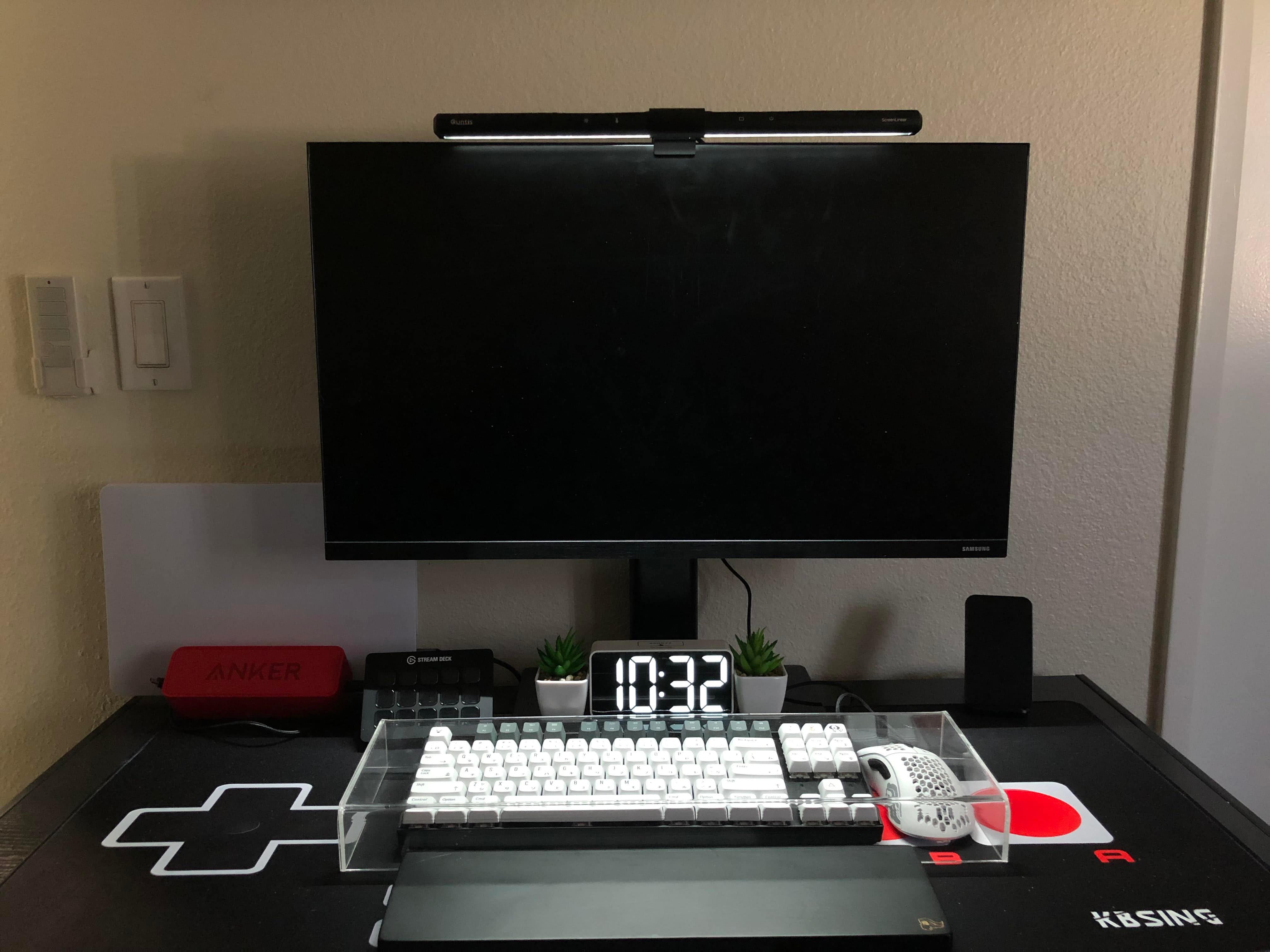 This photo shows the mechanical keyboard and gaming mouse safely under transparent acrylic. 