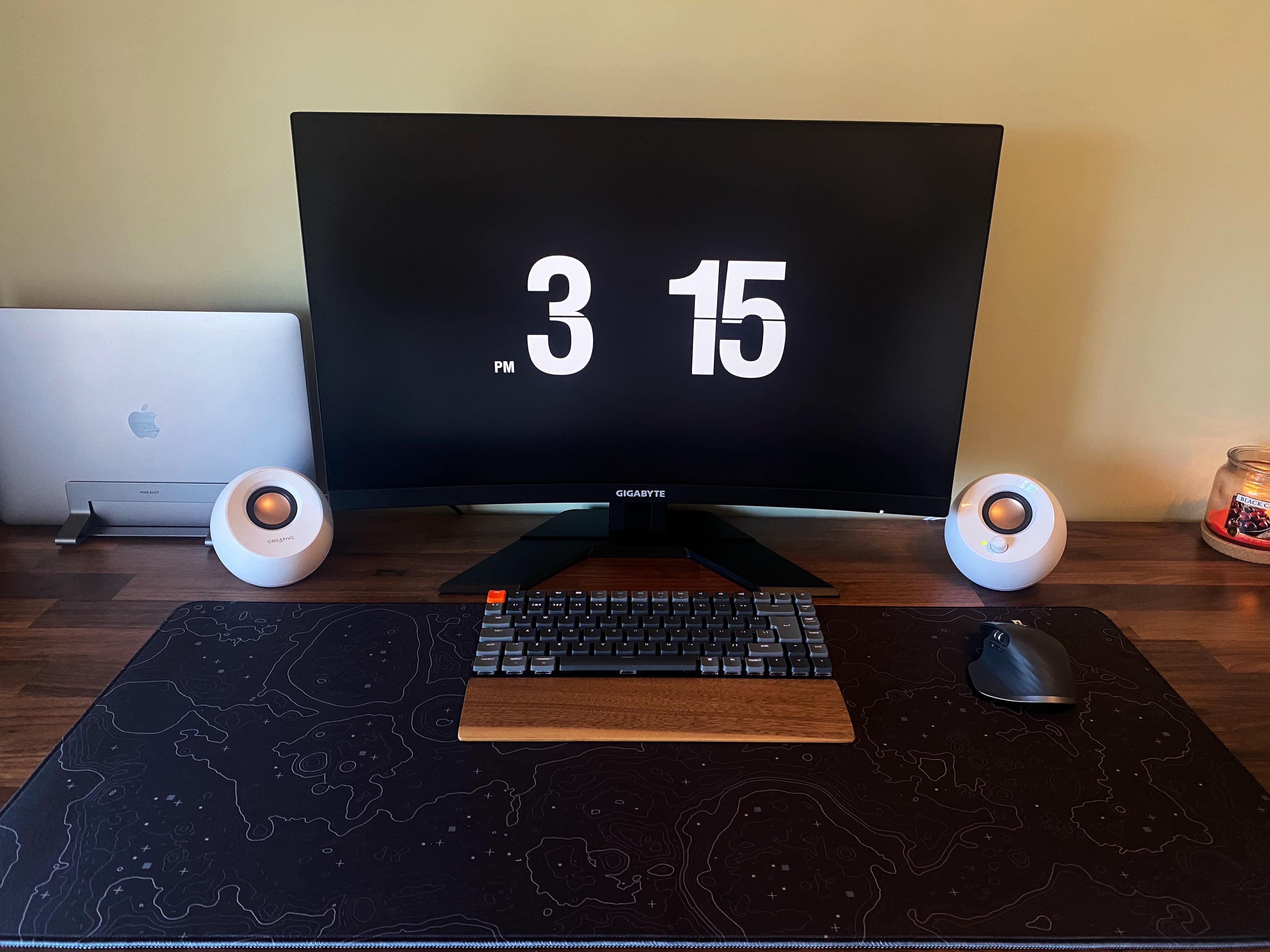 The Creative Pebble speakers on either side of the curved monitor are inexpensive. Maybe too much so. 