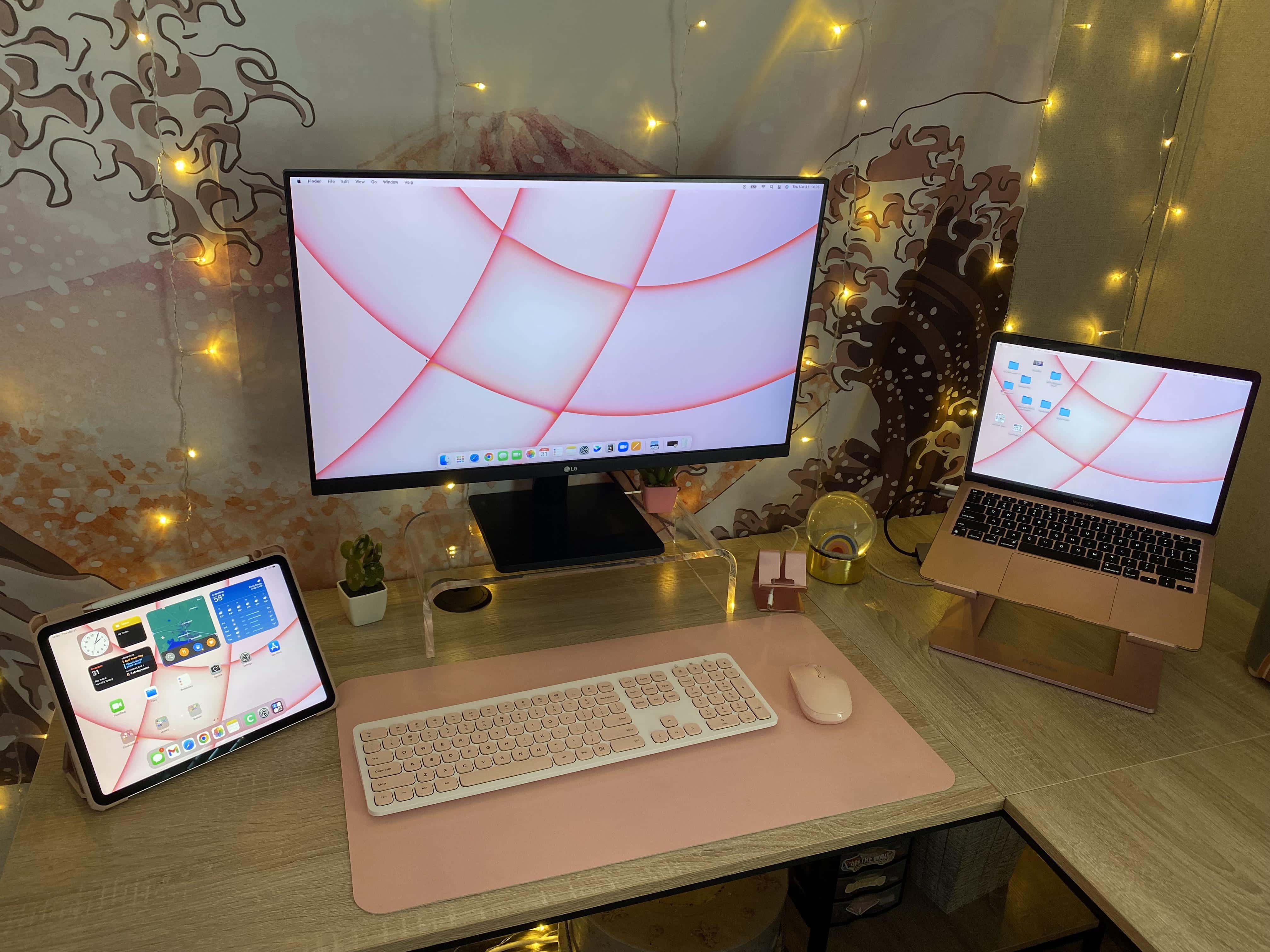 The iPad Air on the left is the new addition to this computer setup.