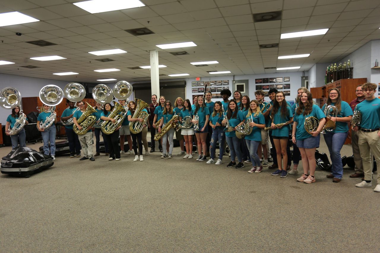 The Robersdale High School Band poses with instruments.