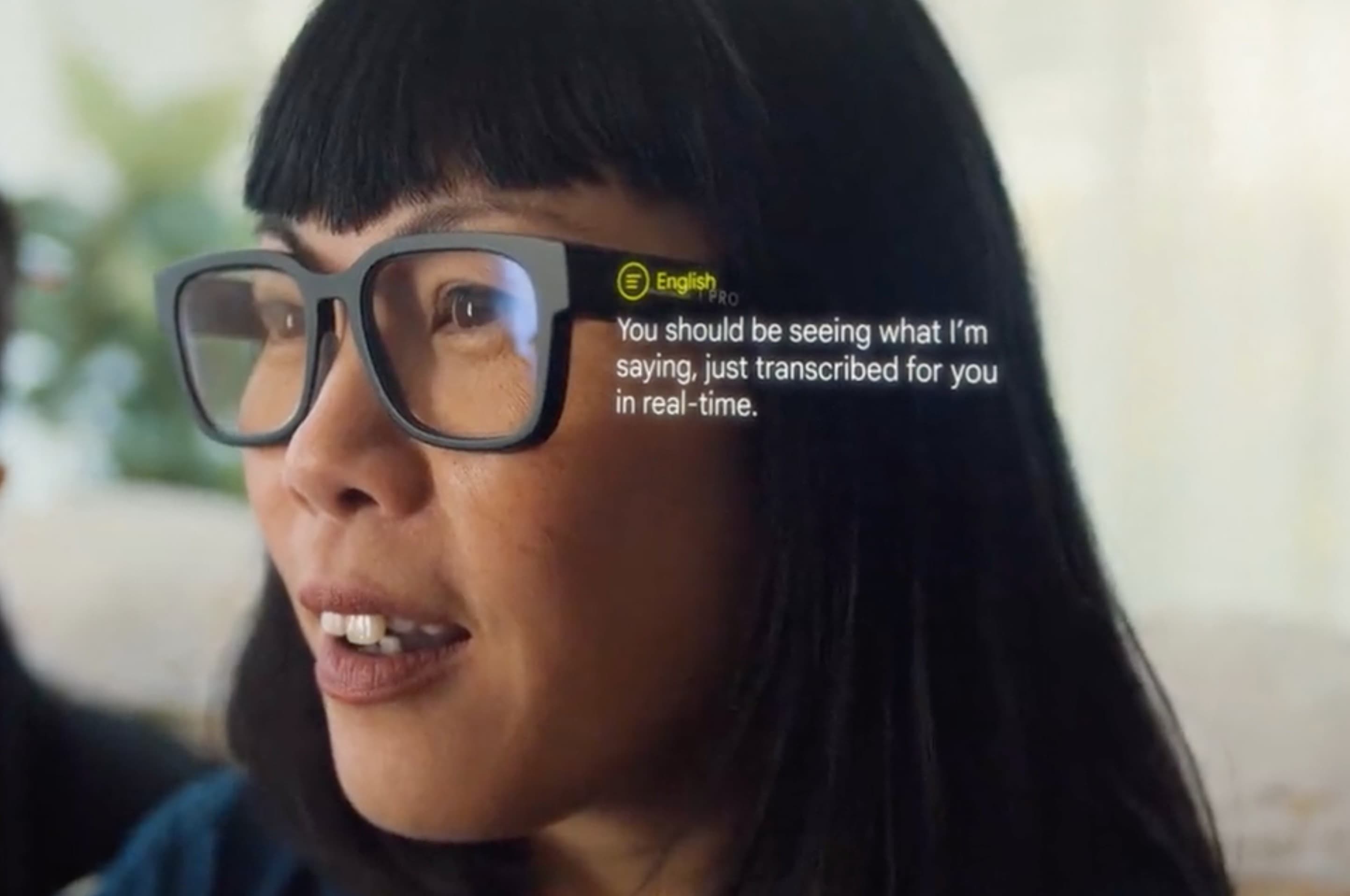 A screen shot from Google's video shows language transcription on the screen.